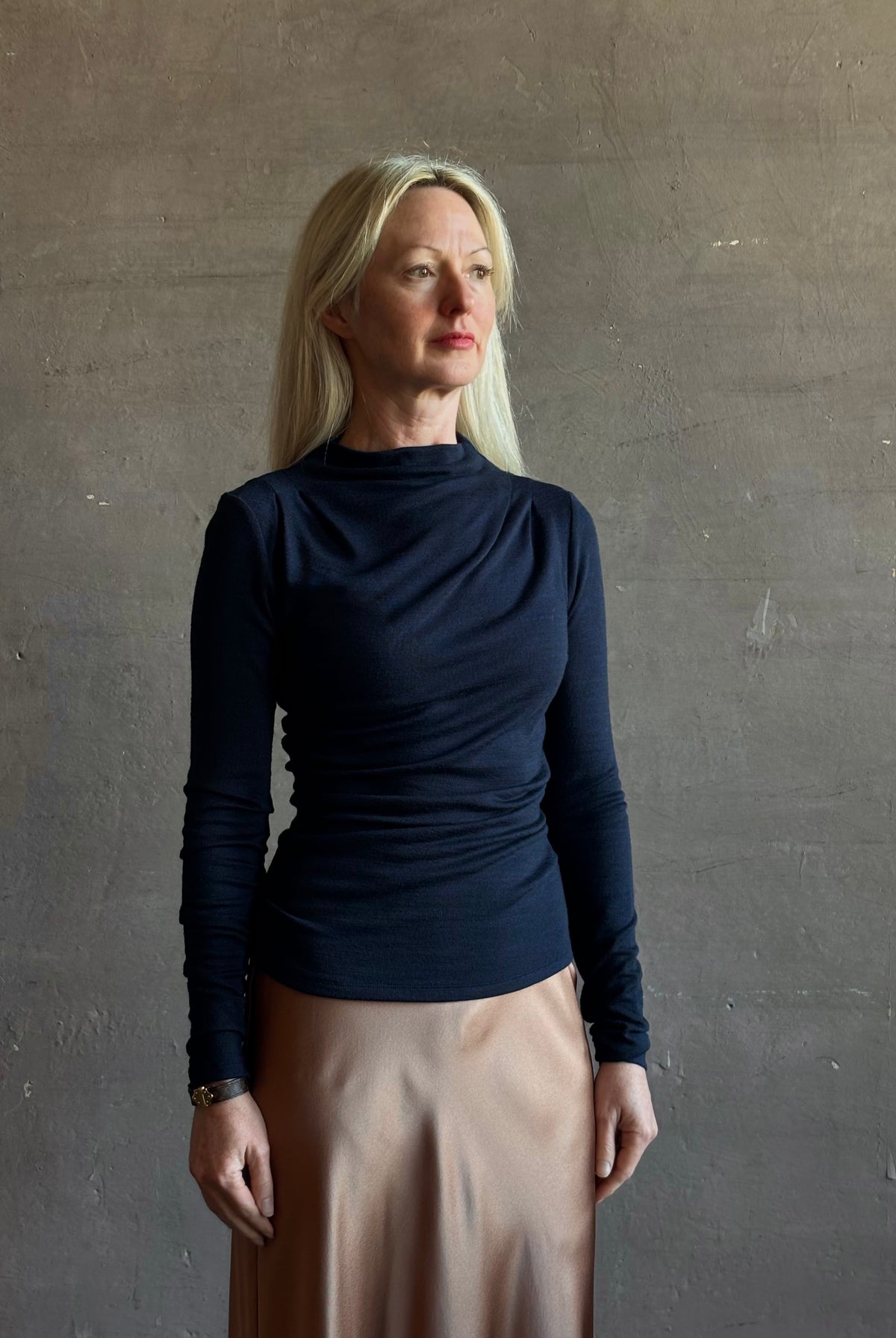 Proenza Schouler Mini Jersey Top with shoulder pleats, ruching down one side, and fluid draping long sleeves mock neck
