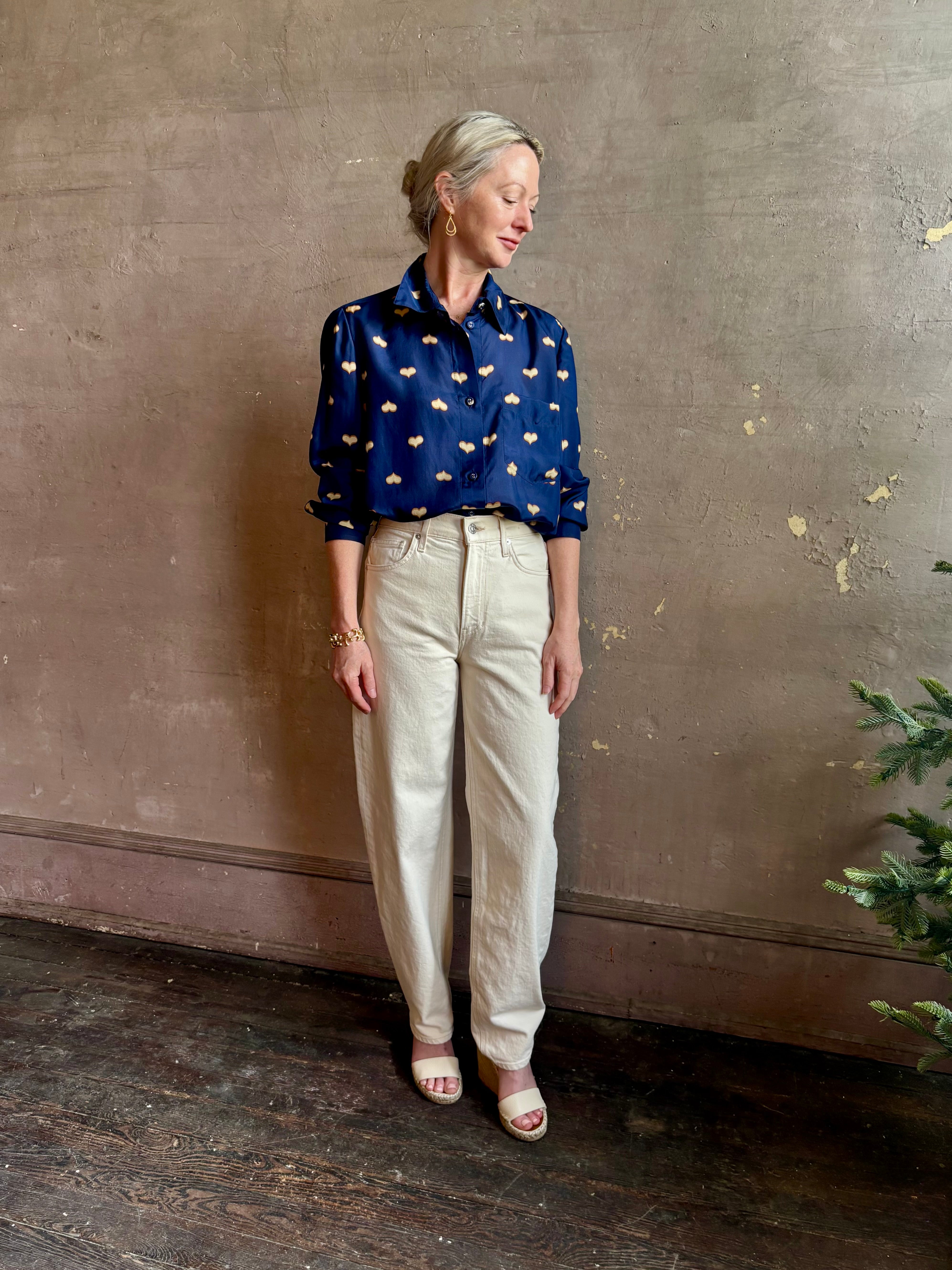mature woman wearing designer Rachel Comey navy silk Lilo button down long sleeve contemporary heart print