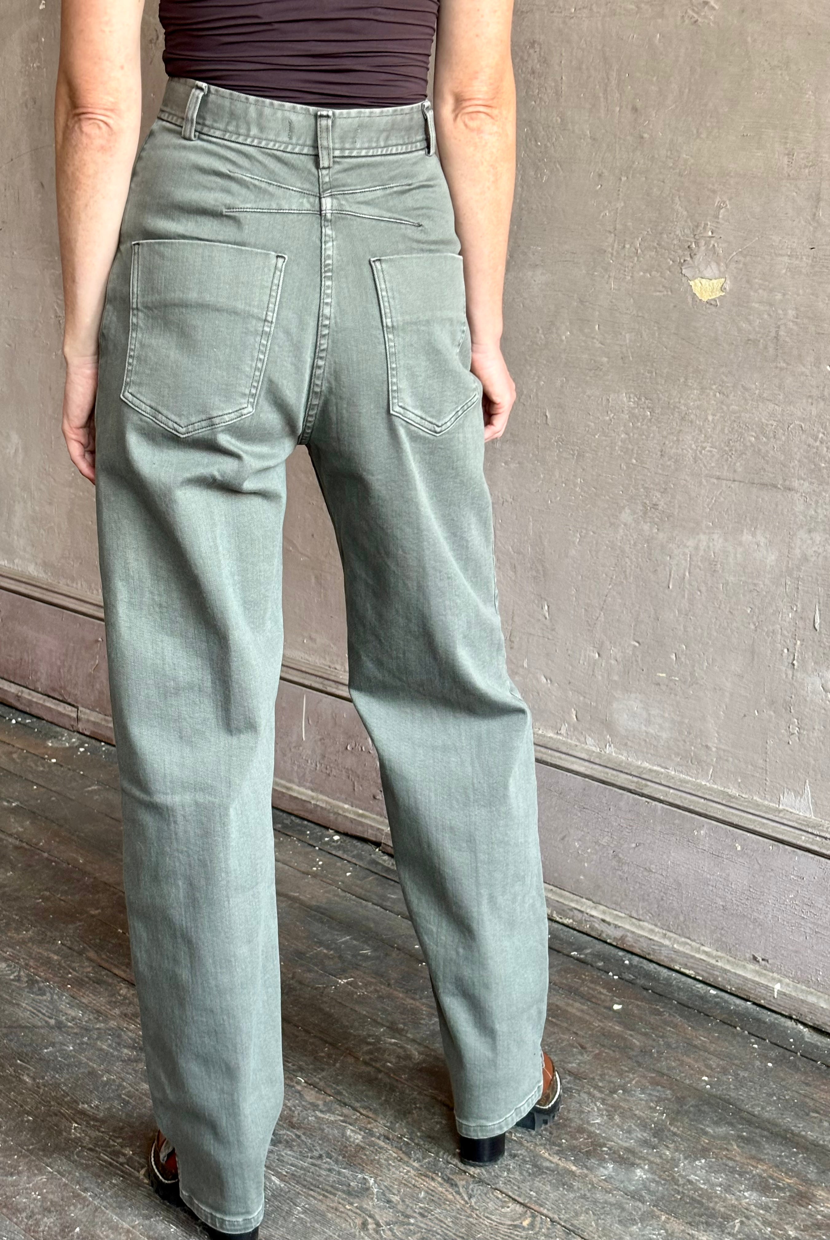 Image of mature woman wearing American designer Rachel Comey Dardo Pant in grey green showcasing expert tailoring with back detail similar to Alaia