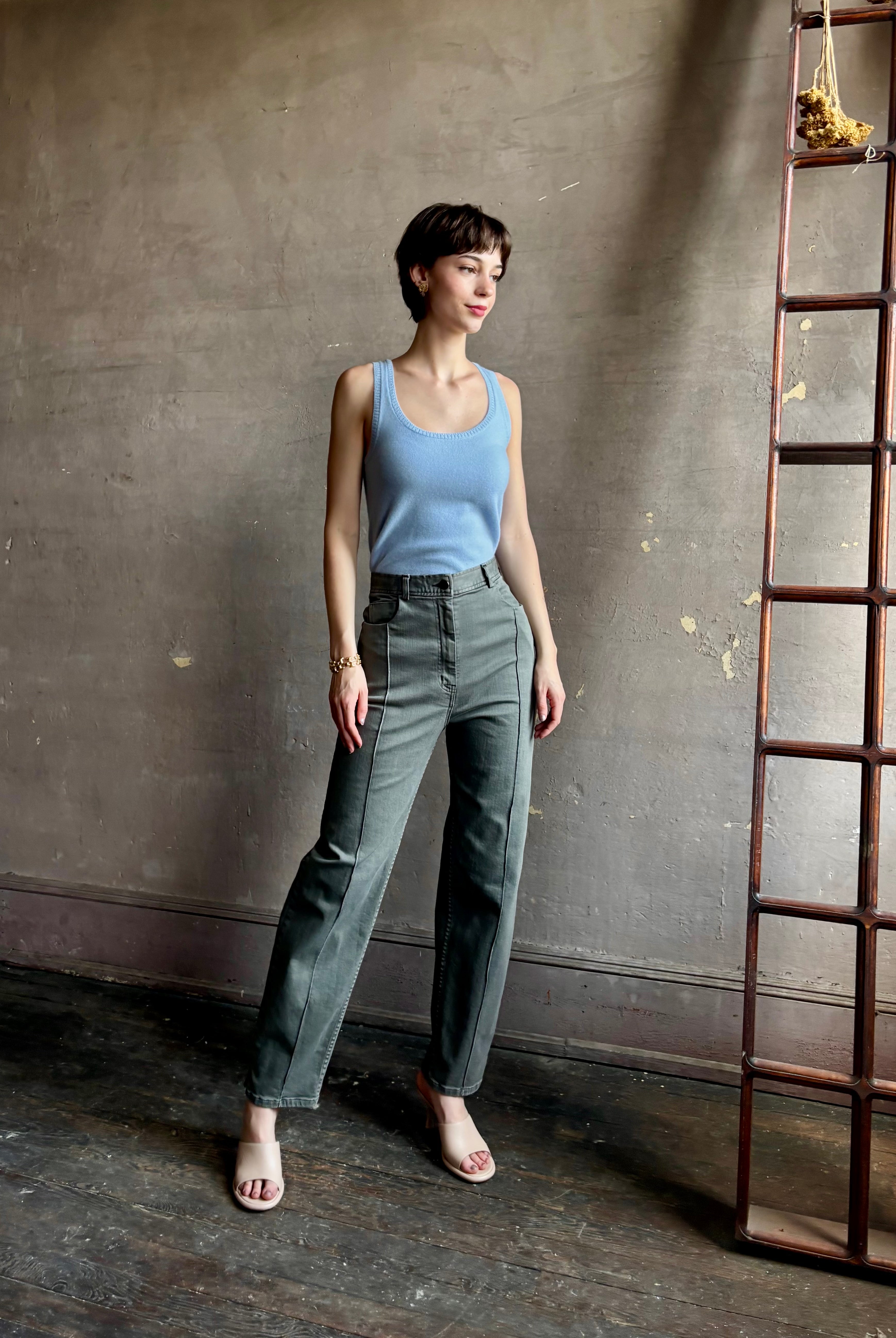 Woman wearing designer Rachel Comey Dardo green comfy stretch cotton Pant high rise pintuck front seam flattering