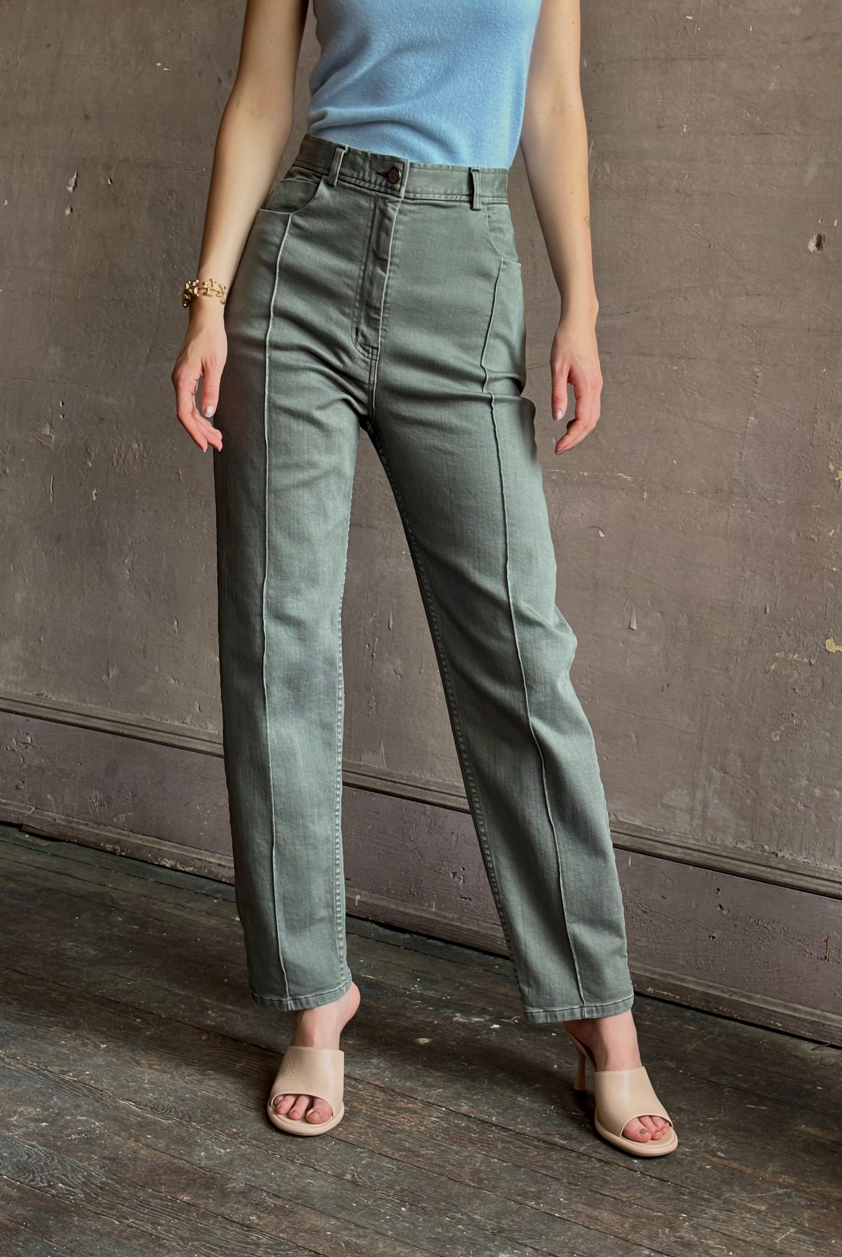 Woman wearing designer Rachel Comey Dardo green comfy stretch cotton Pant high rise pintuck front seam