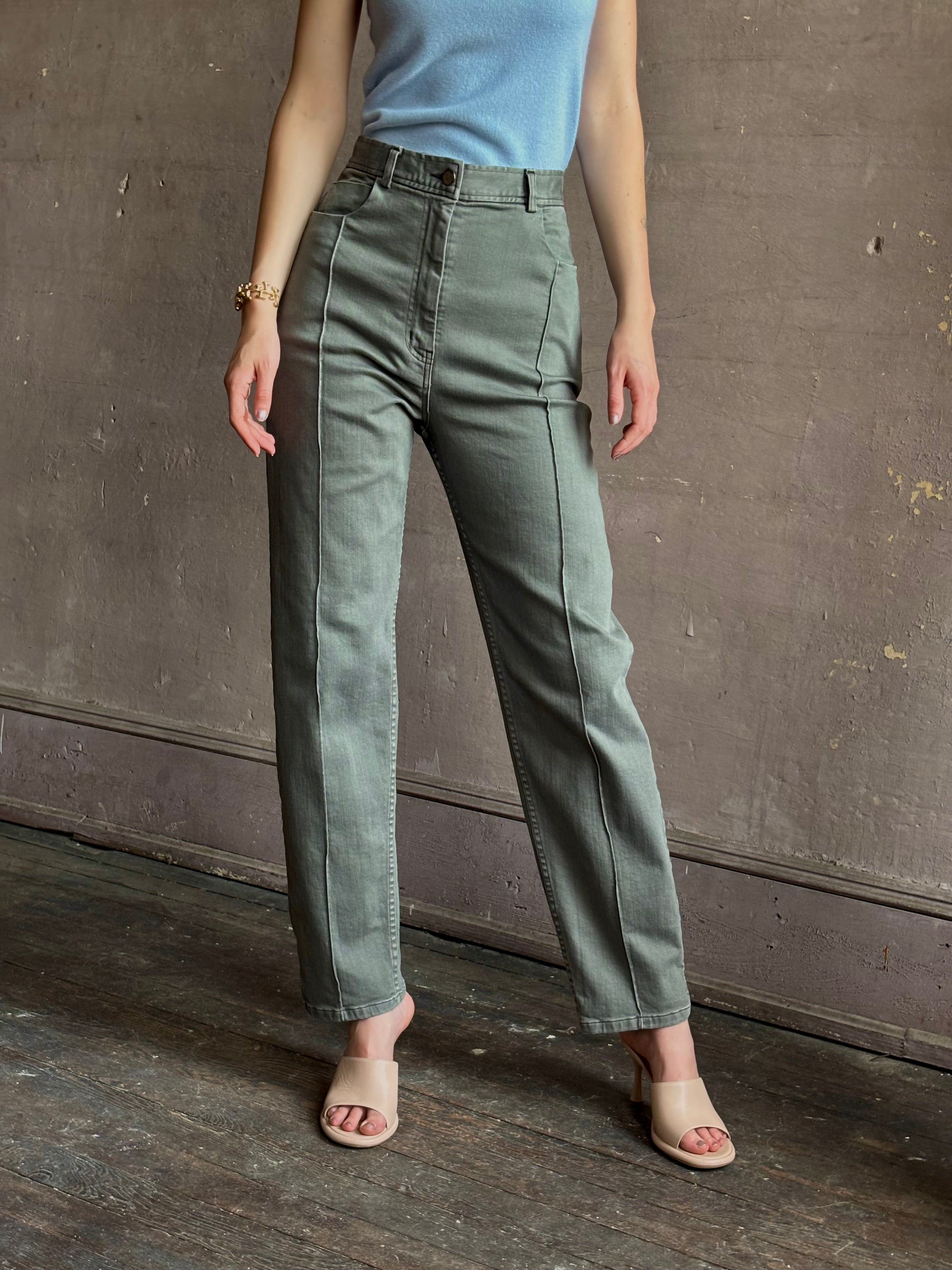 Woman wearing designer Rachel Comey Dardo green comfy stretch cotton Pant high rise pintuck front seam