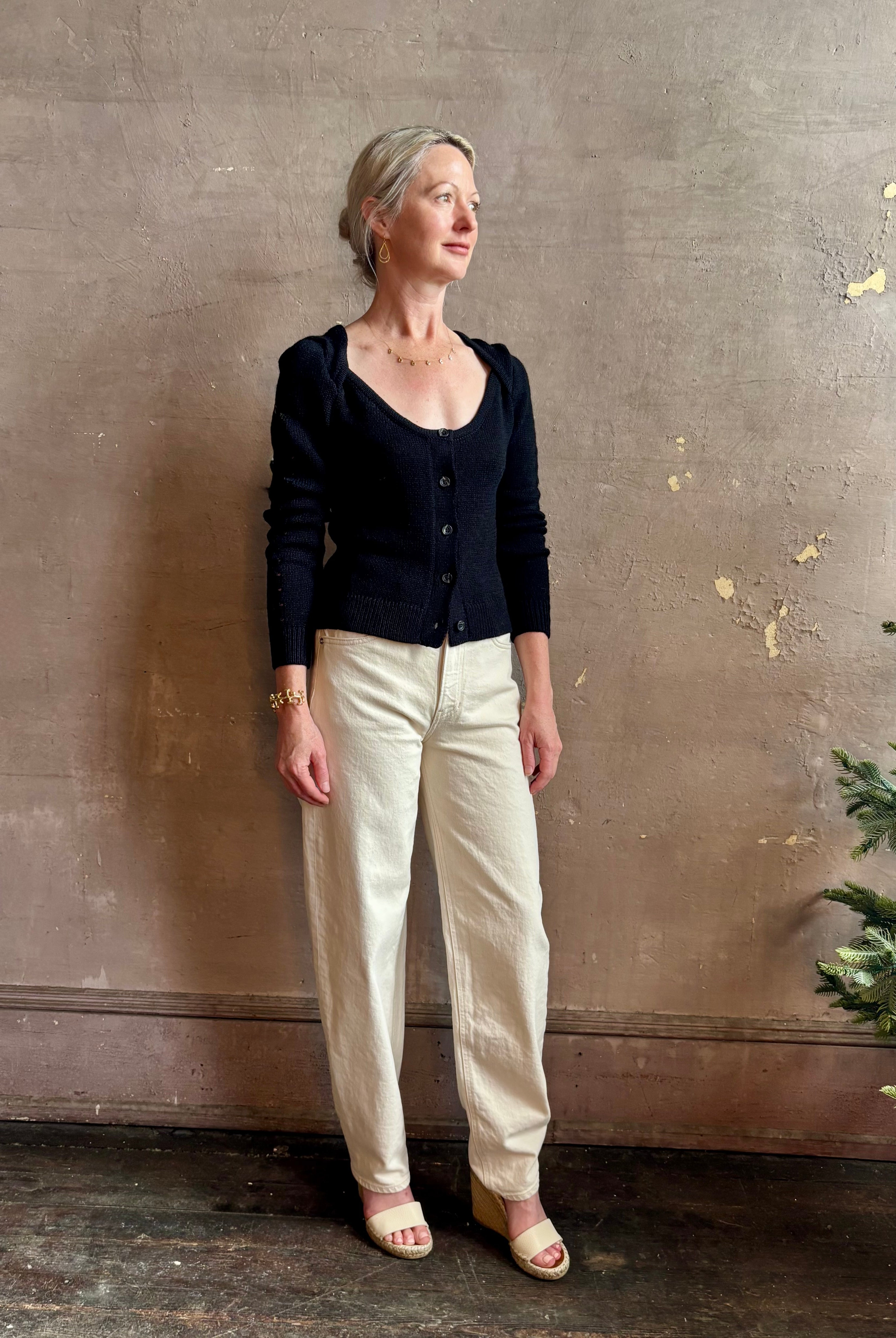 Mature woman wearing designer rachel comey Etla knit top with long sleeves sweetheart neckline in timeless black