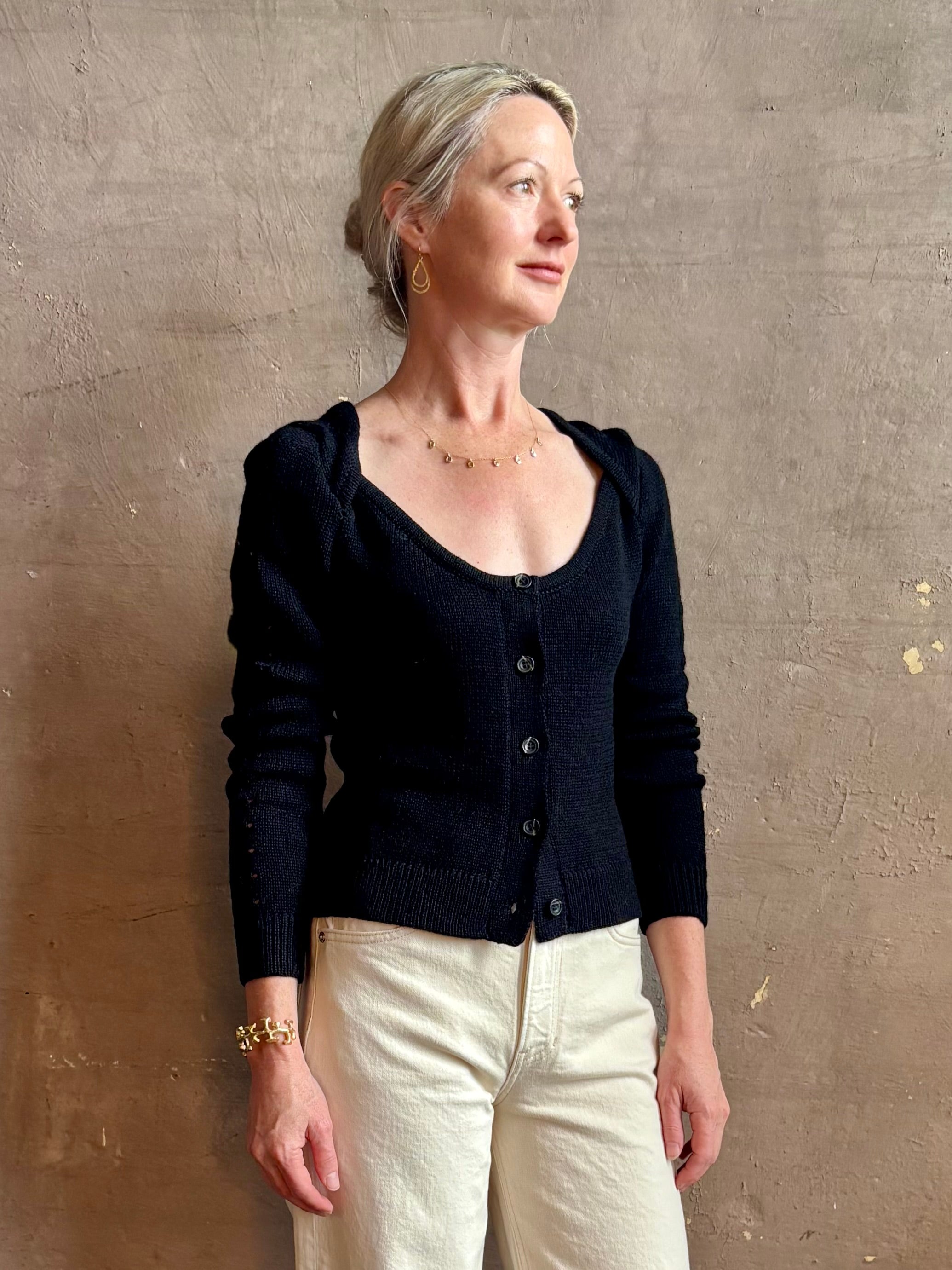 Mature woman wearing designer rachel comey Etla knit top with long sleeves sweetheart neckline in timeless black