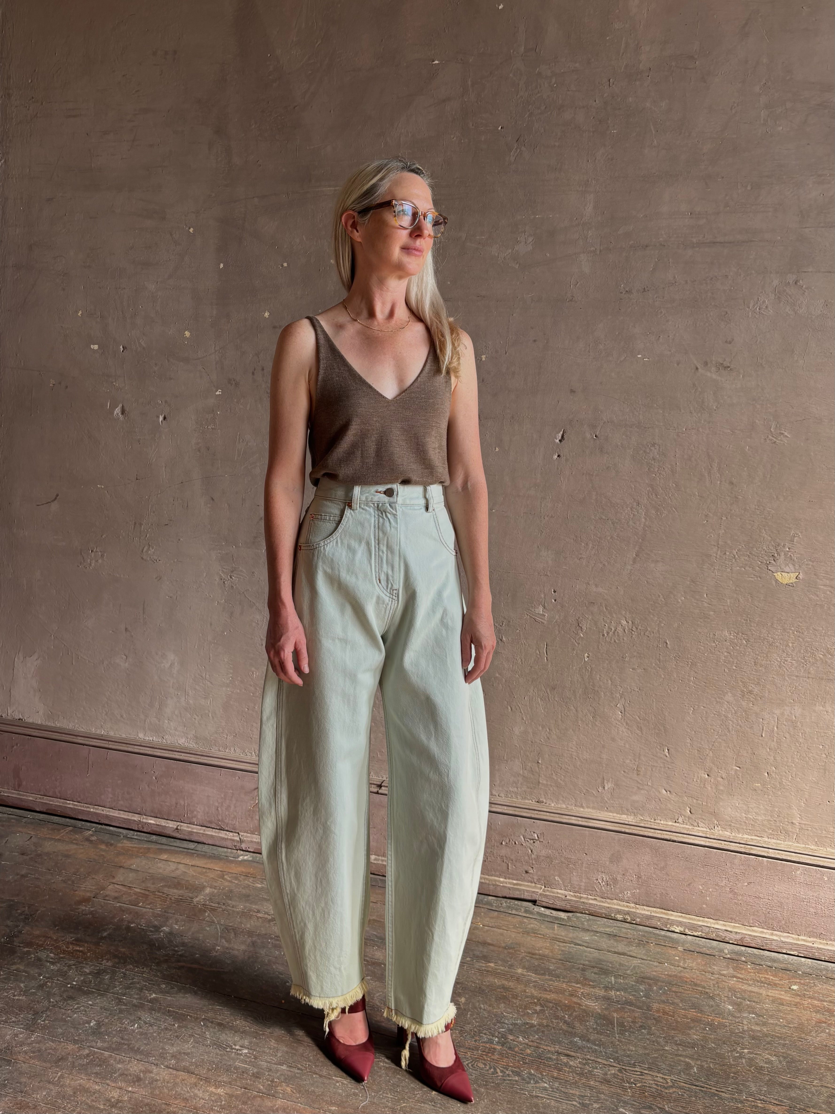 Mature woman wearing Rachel Comey barrel leg Keenan rigid cotton denim pant sculptural designer jean made in USA