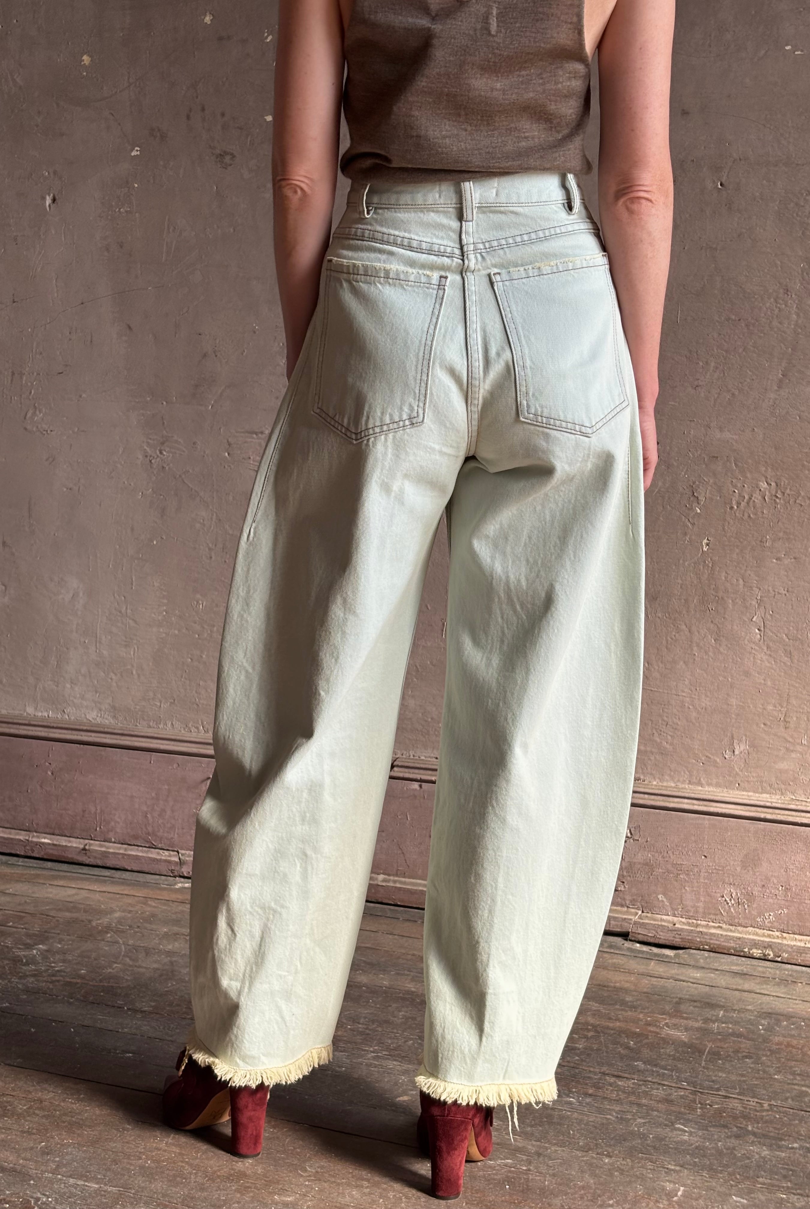 Mature woman wearing Rachel Comey barrel leg Keenan rigid cotton denim pant sculptural designer jean made in USA