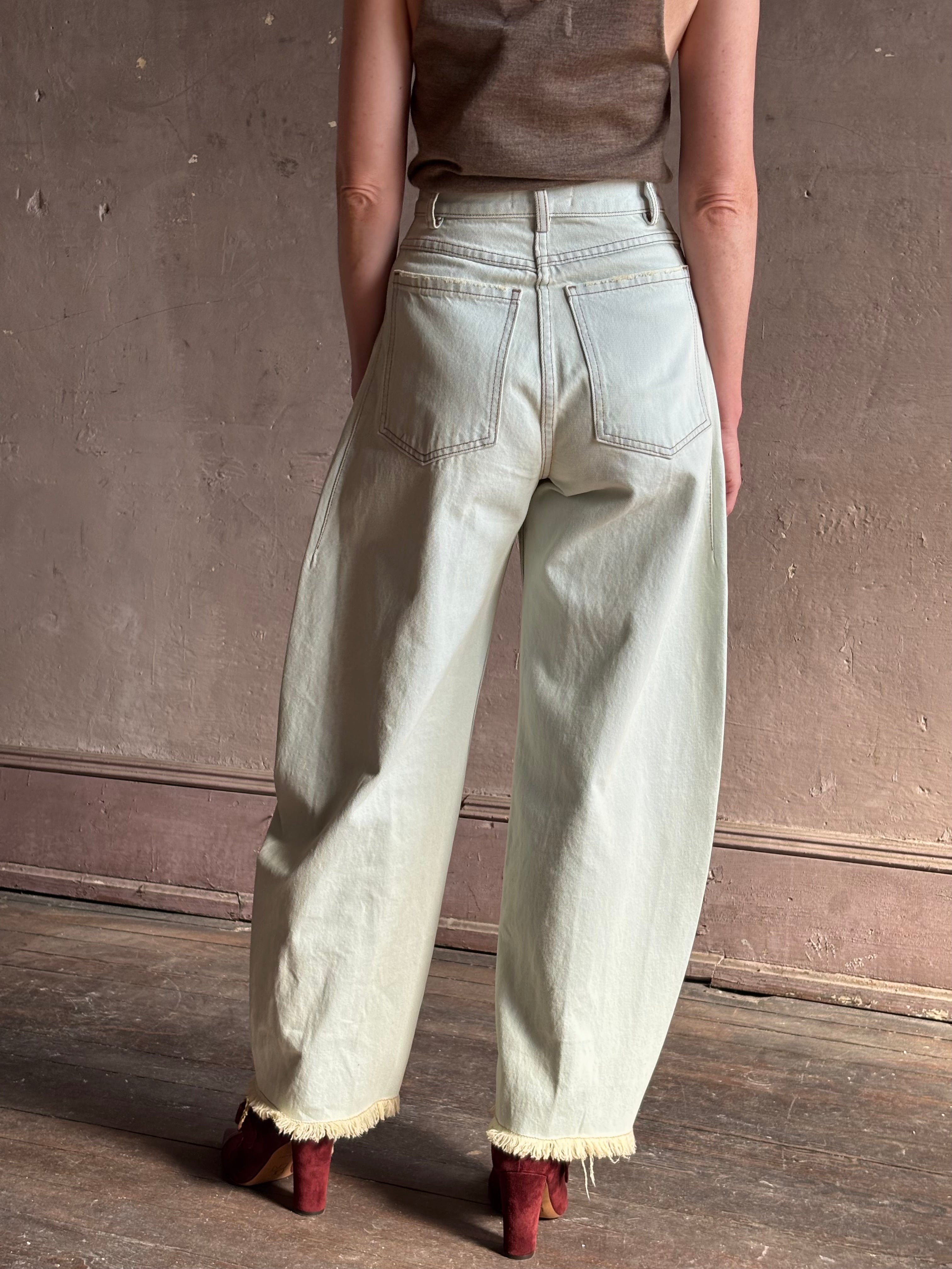 Mature woman wearing Rachel Comey barrel leg Keenan rigid cotton denim pant sculptural designer jean made in USA