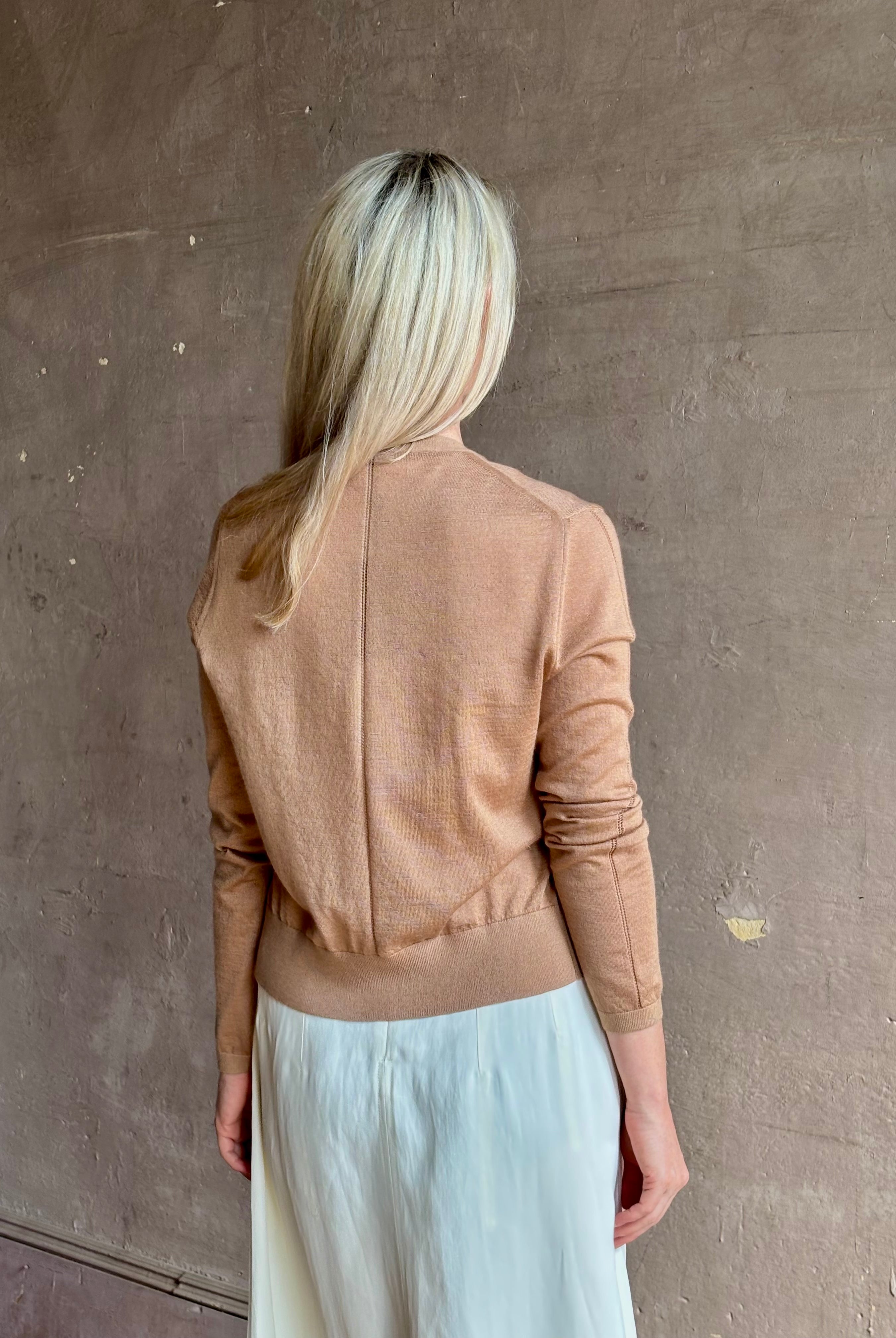 Mature woman wearing Rachel Comey long sleeve caramel cardigan leightweight plunging v-neck layering