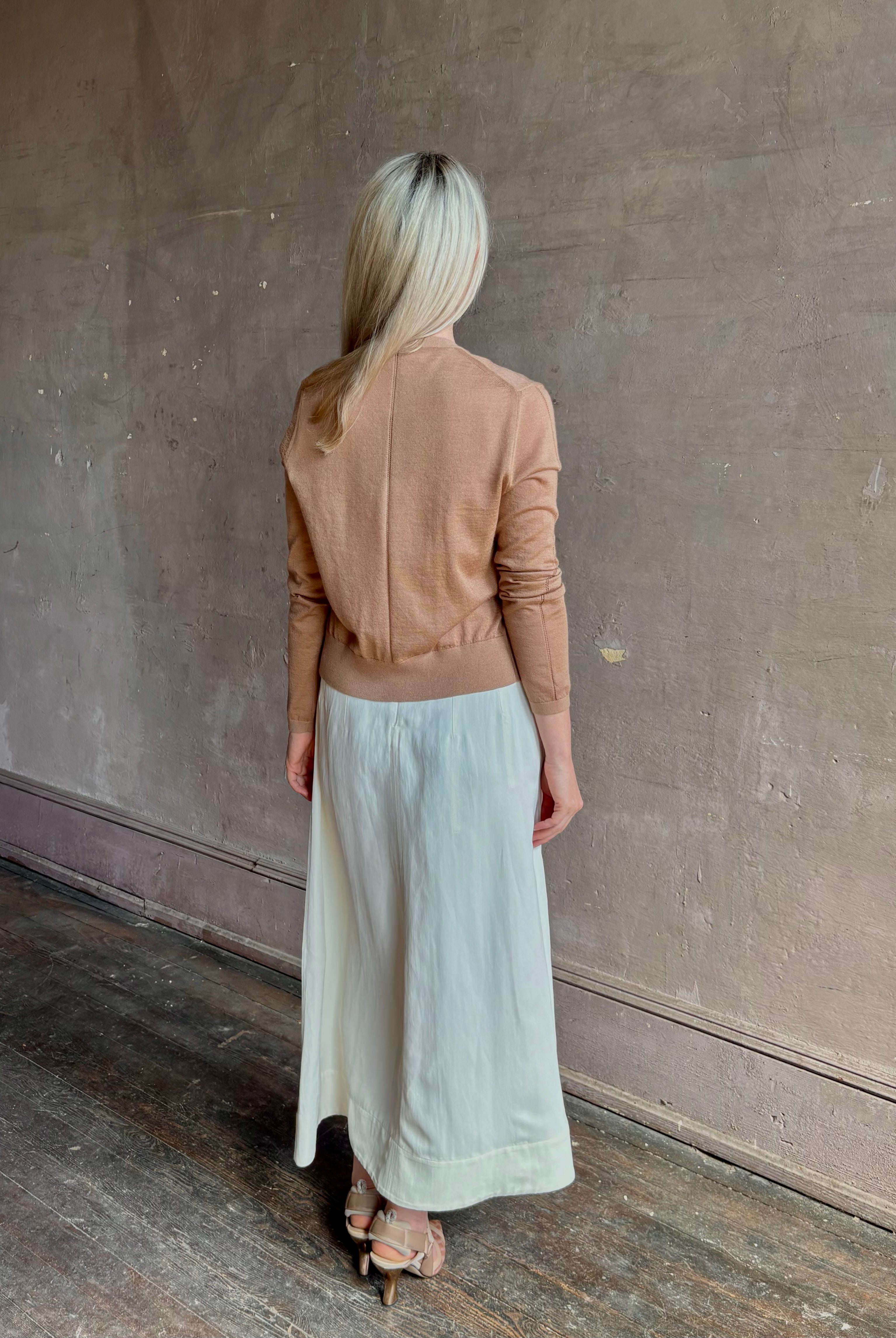 Mature woman wearing Rachel Comey long sleeve caramel cardigan leightweight plunging v-neck layering