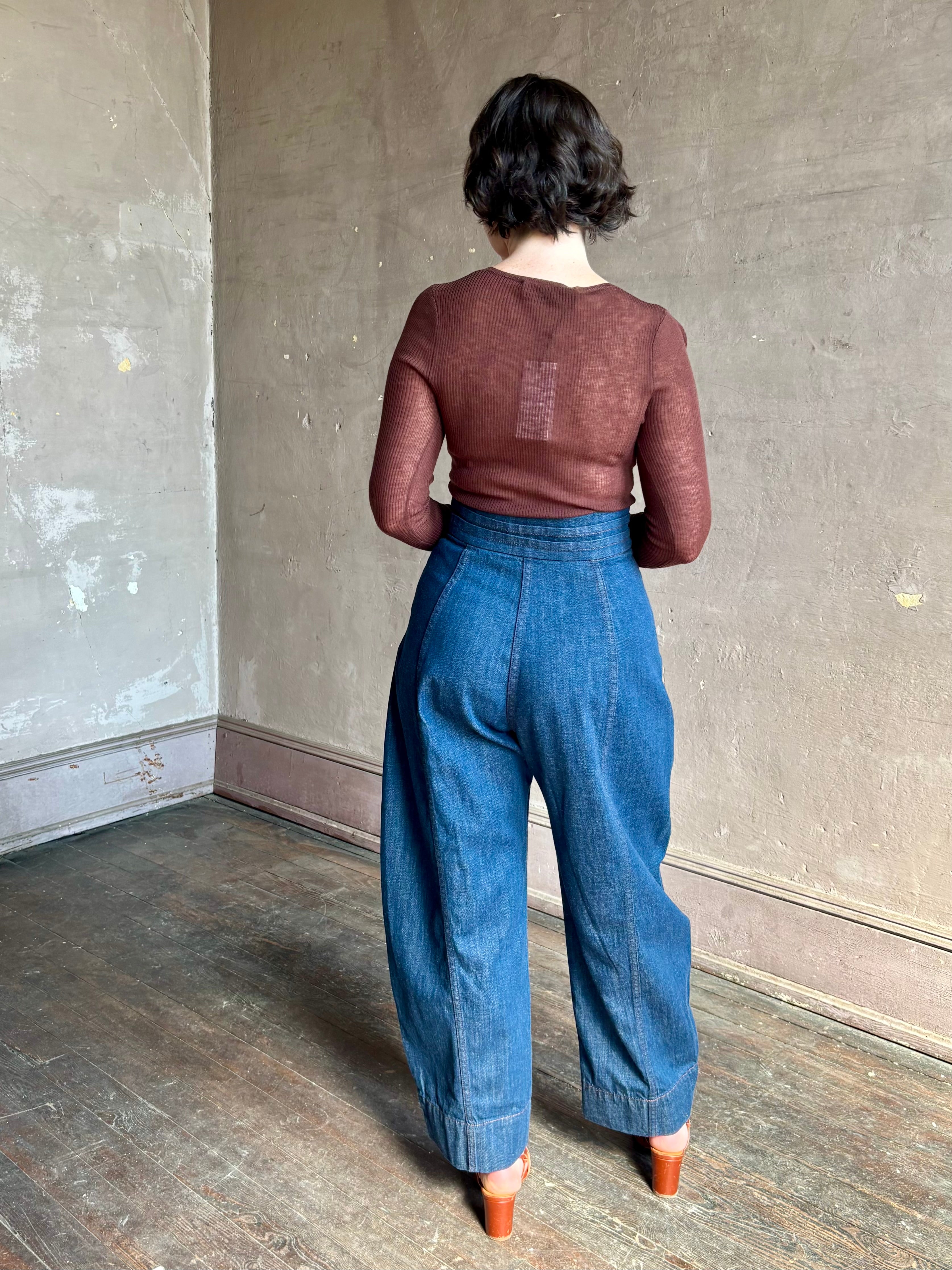 Rachel Comey sculptural high-rise dark wash denim with a built-in cummerbund-style waist barrel leg