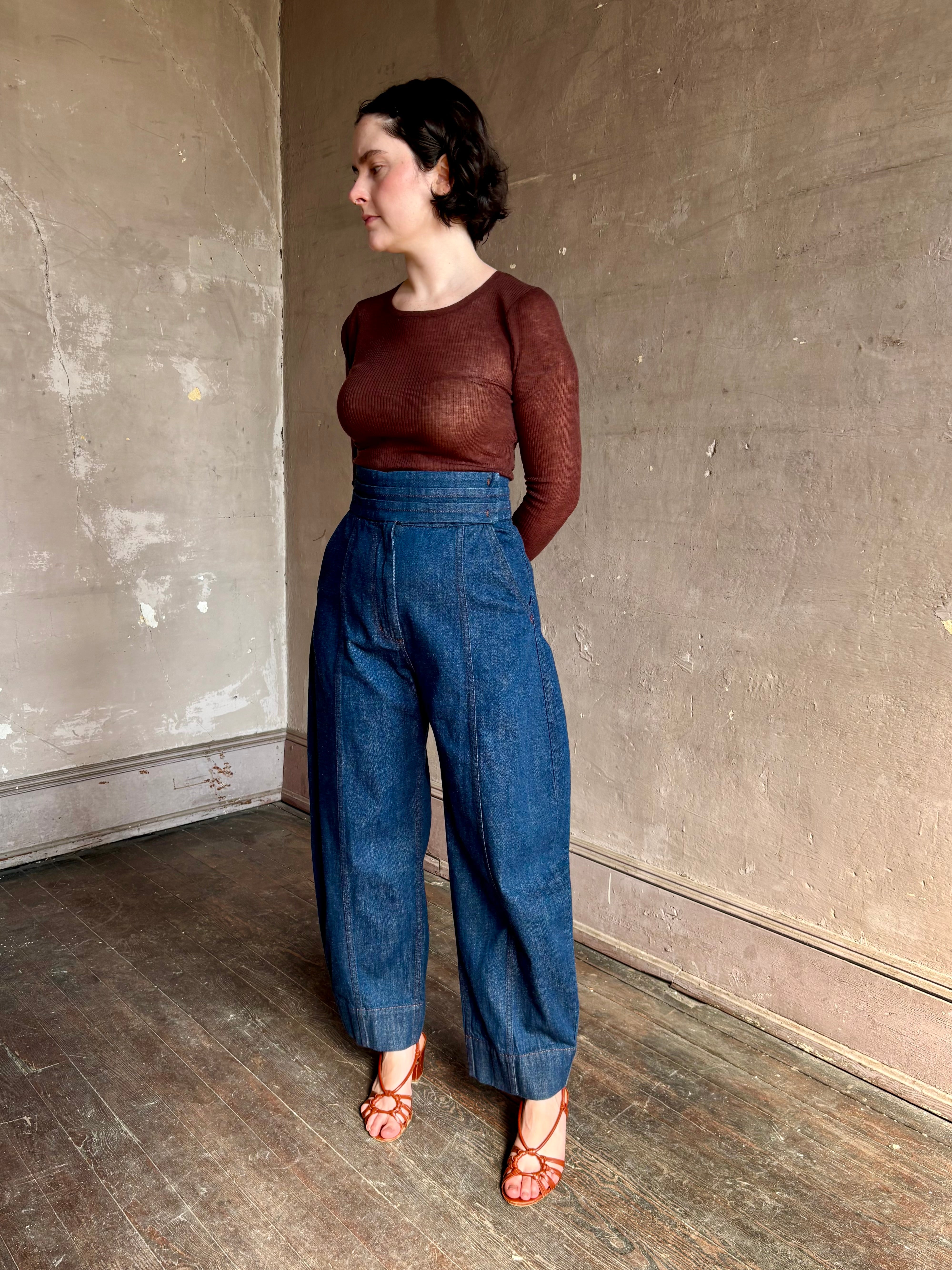 Rachel Comey sculptural high-rise dark wash denim with a built-in cummerbund-style waist barrel leg