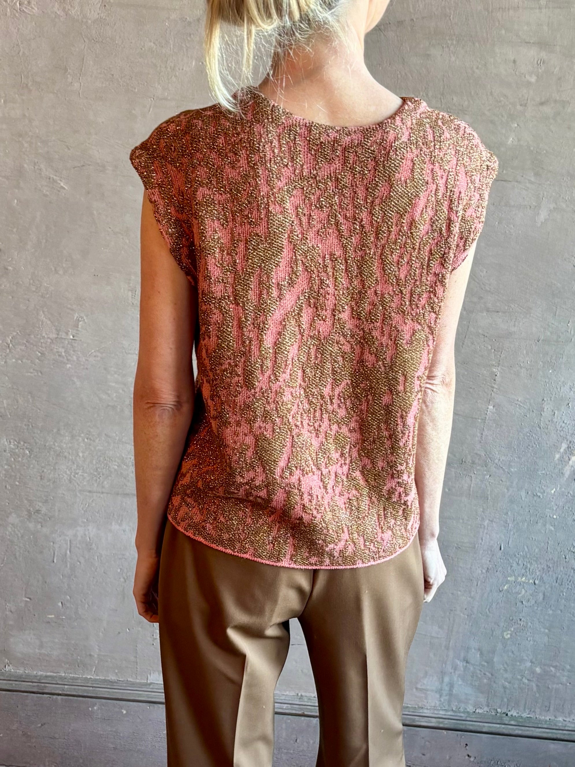Image of woman wearing New York Designer Rachel Comey pink Brocca sweater with bronze metallic abstract pattern
