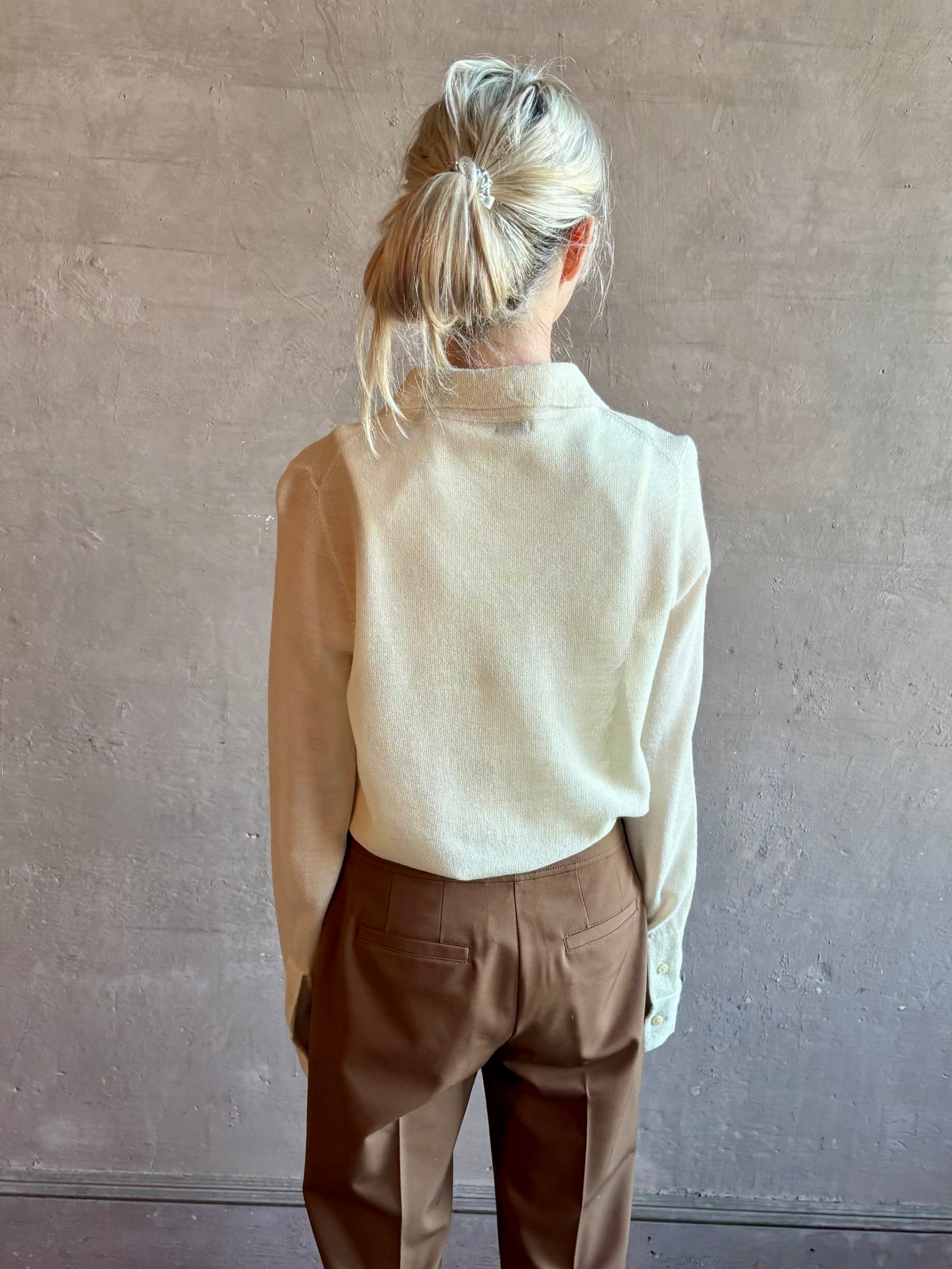 Image of woman wearing Premium Baby Alpaca Mulberry Silk Calma shirt by Rachel Comey with button front, long sleeves and button front in cream