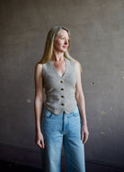 Mature woman wearing advanced contemporary Women's Rag and Bone Ella Vest in dark taupe offers a sophisticated layering in fitted knit