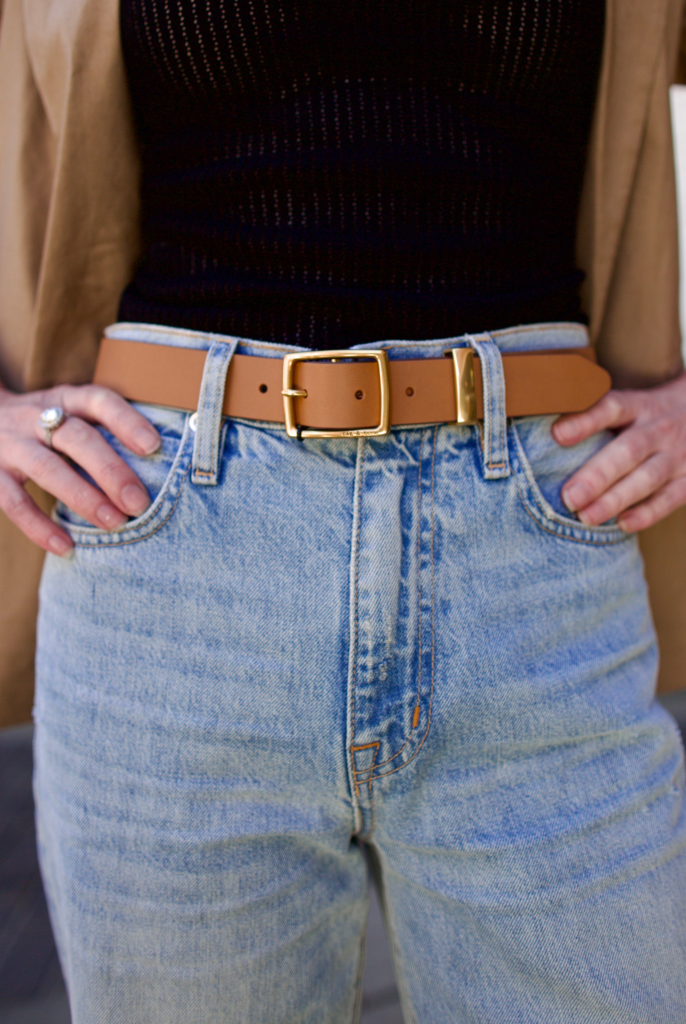 mature woman wearing luxury Rag and Bone tan brown leather belt square matte brass color buckle 1" wide