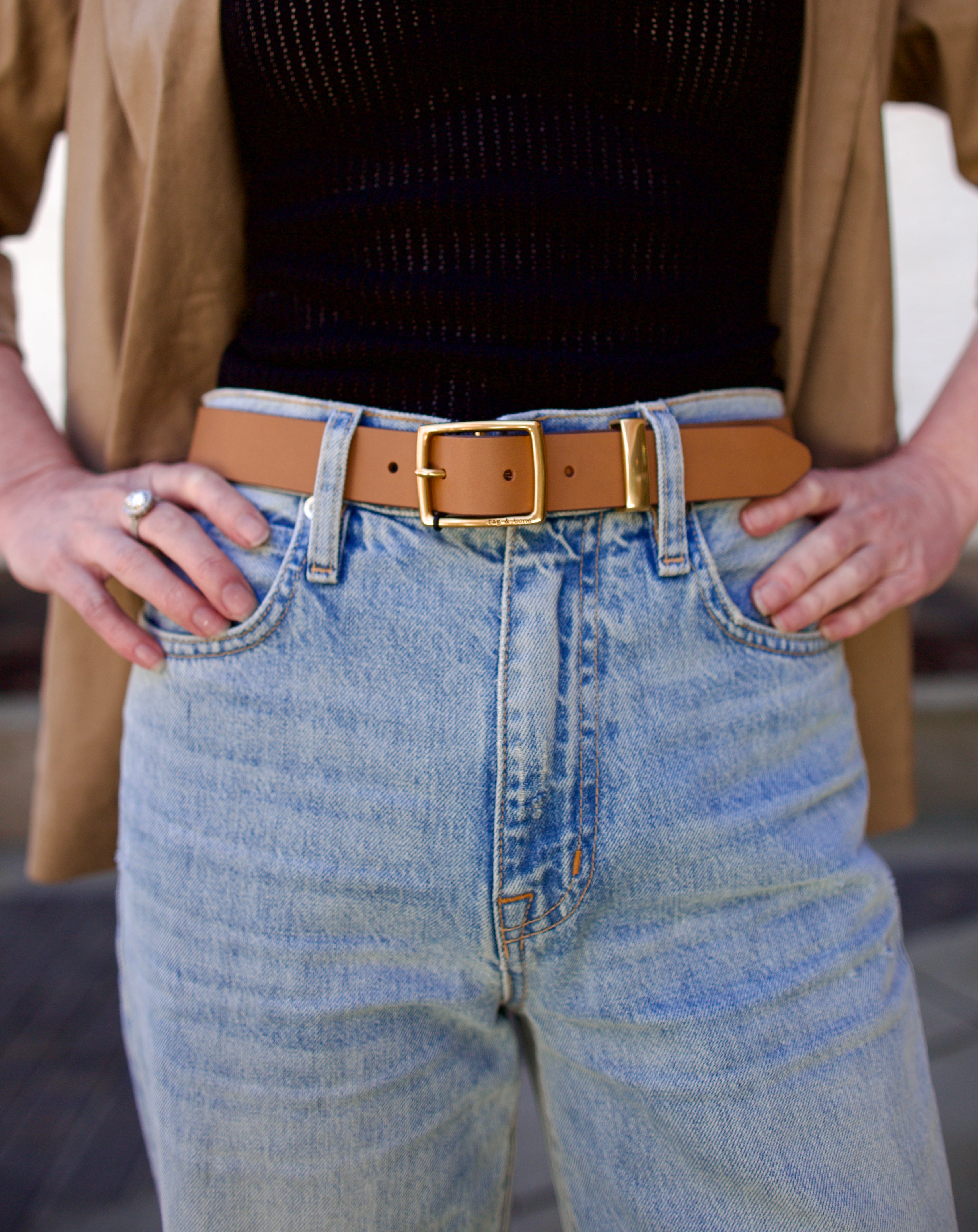 mature woman wearing luxury Rag and Bone tan brown leather belt square matte brass color buckle 1" wide
