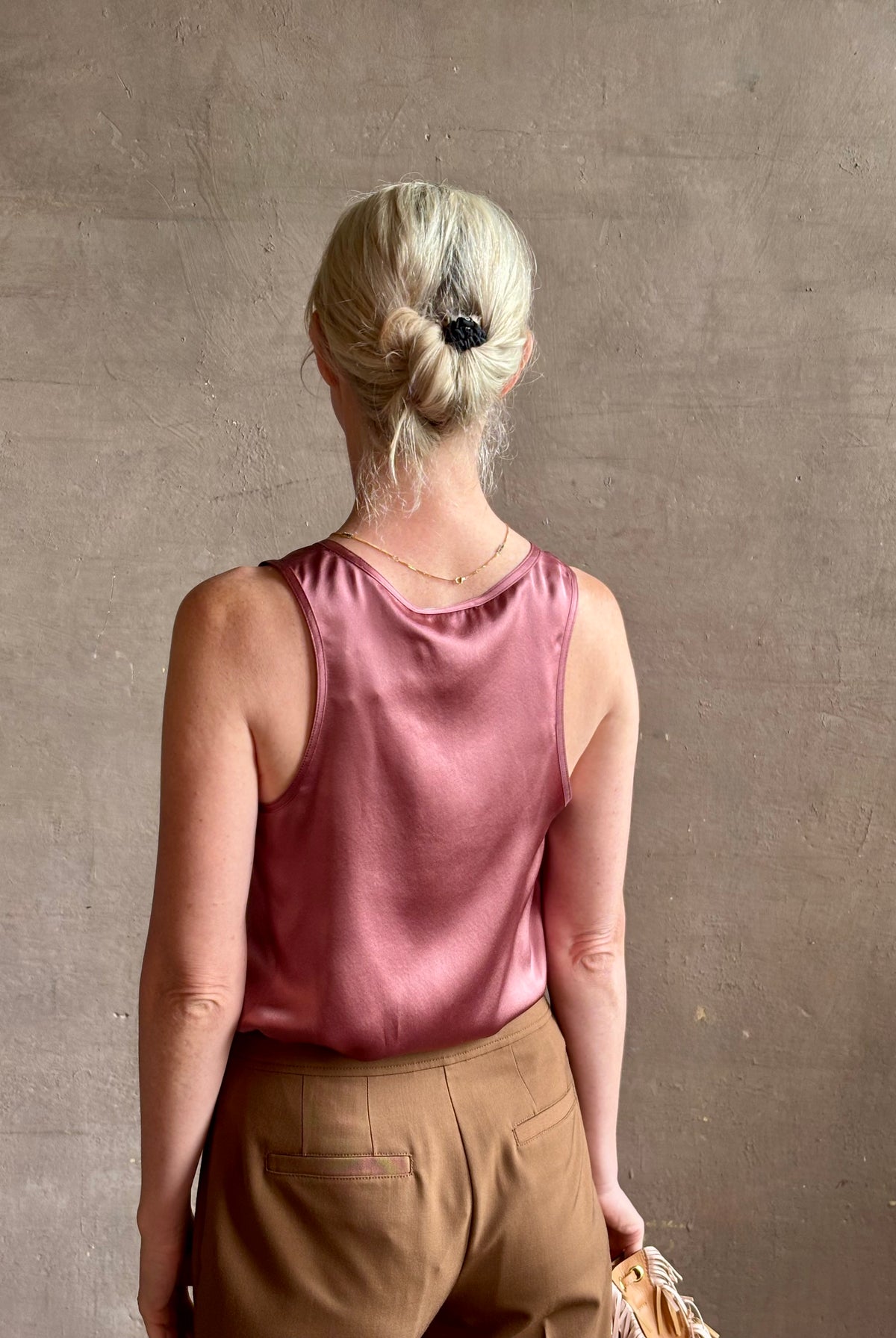 Mature woman wearing Sablyn Claudia B Scoop Neck Silk Tank in Desert Bloom flattering scoop neckline Made in the USA effortlessly elevated