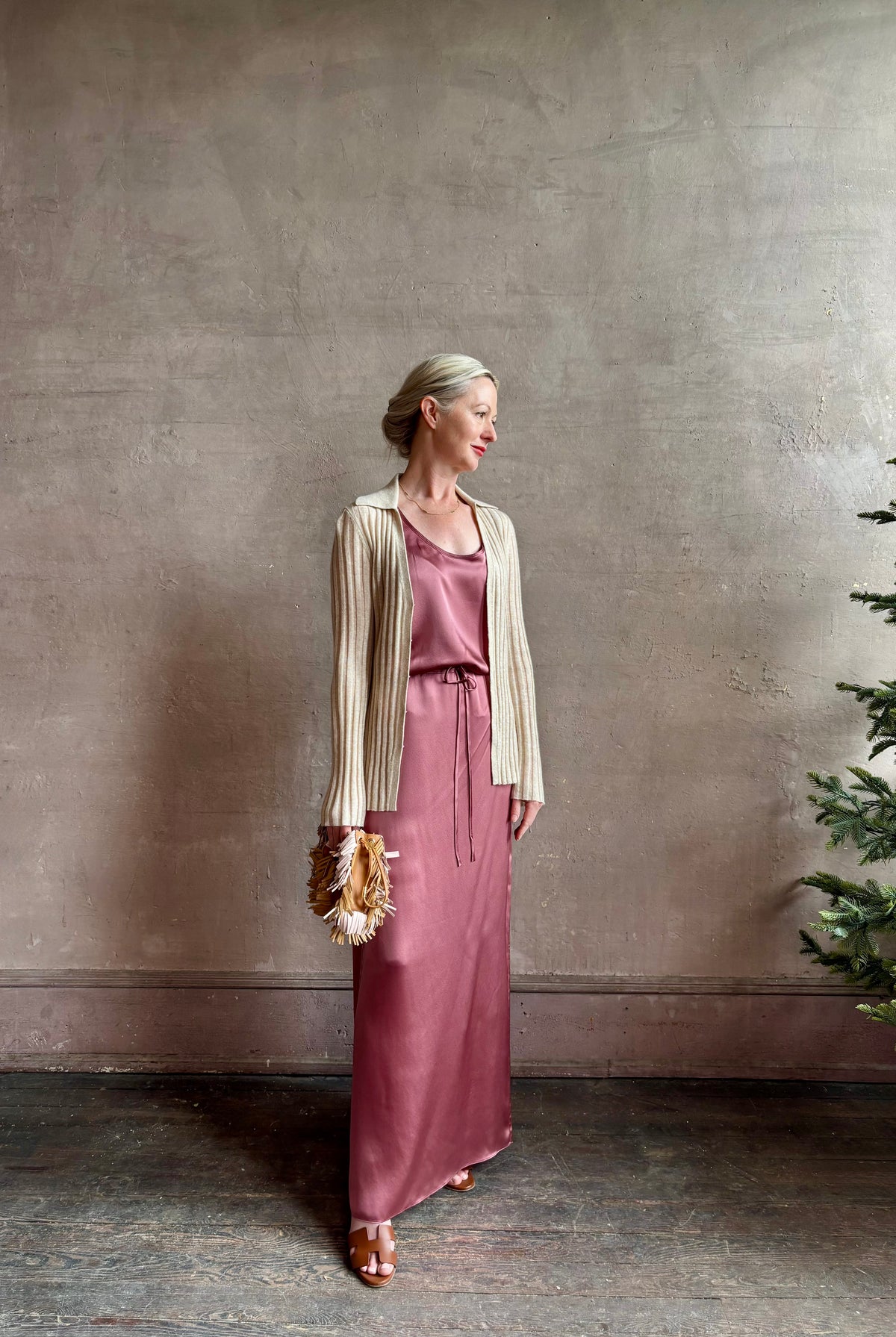 Mature woman wearing Sablyn Claudia B Scoop Neck Silk Tank and skirt set in Desert Bloom flattering scoop neckline Made in the USA effortlessly elevated