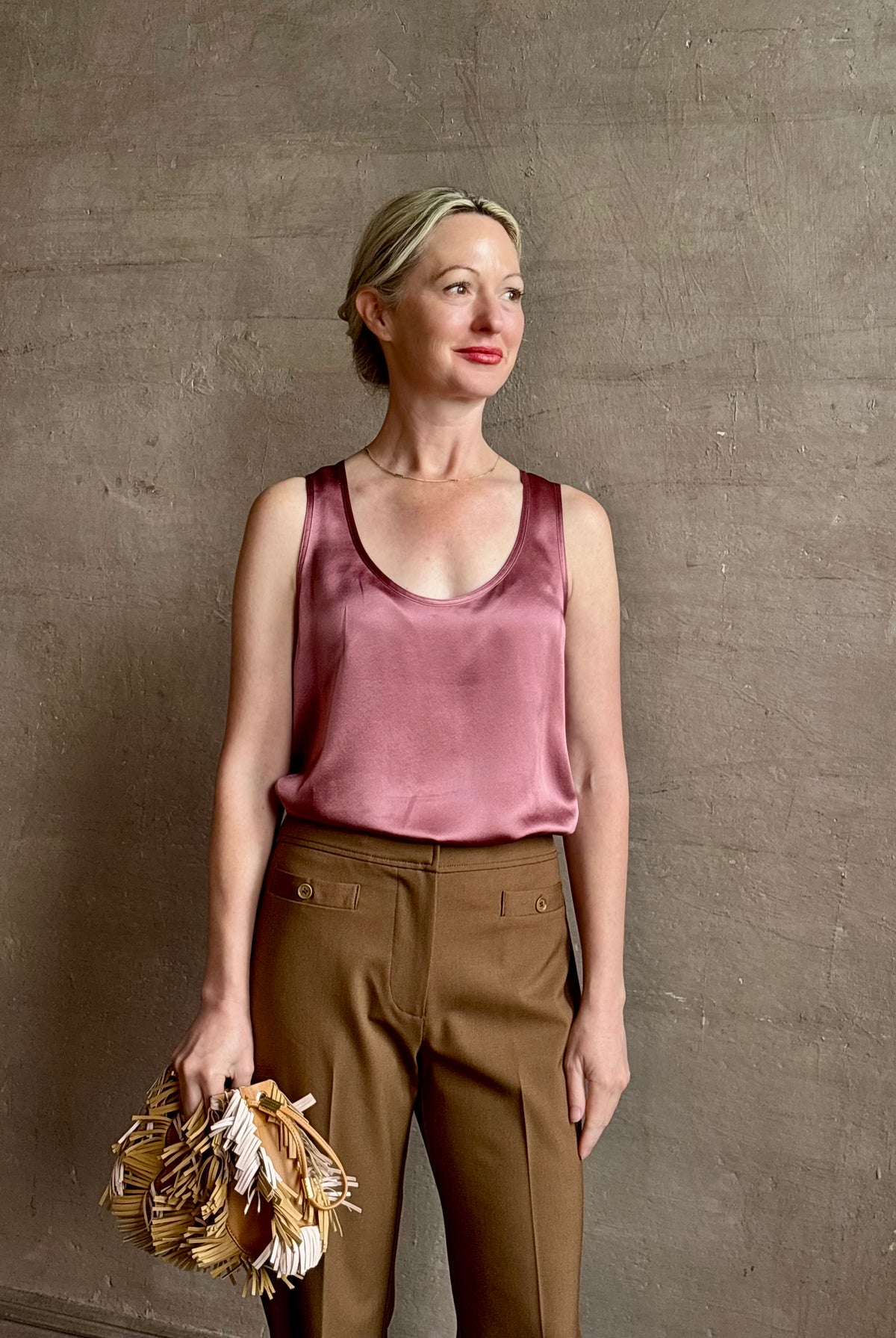 Mature woman wearing Sablyn Claudia B Scoop Neck Silk Tank in Pink Rose flattering scoop neckline Made in the USA effortlessly elevated