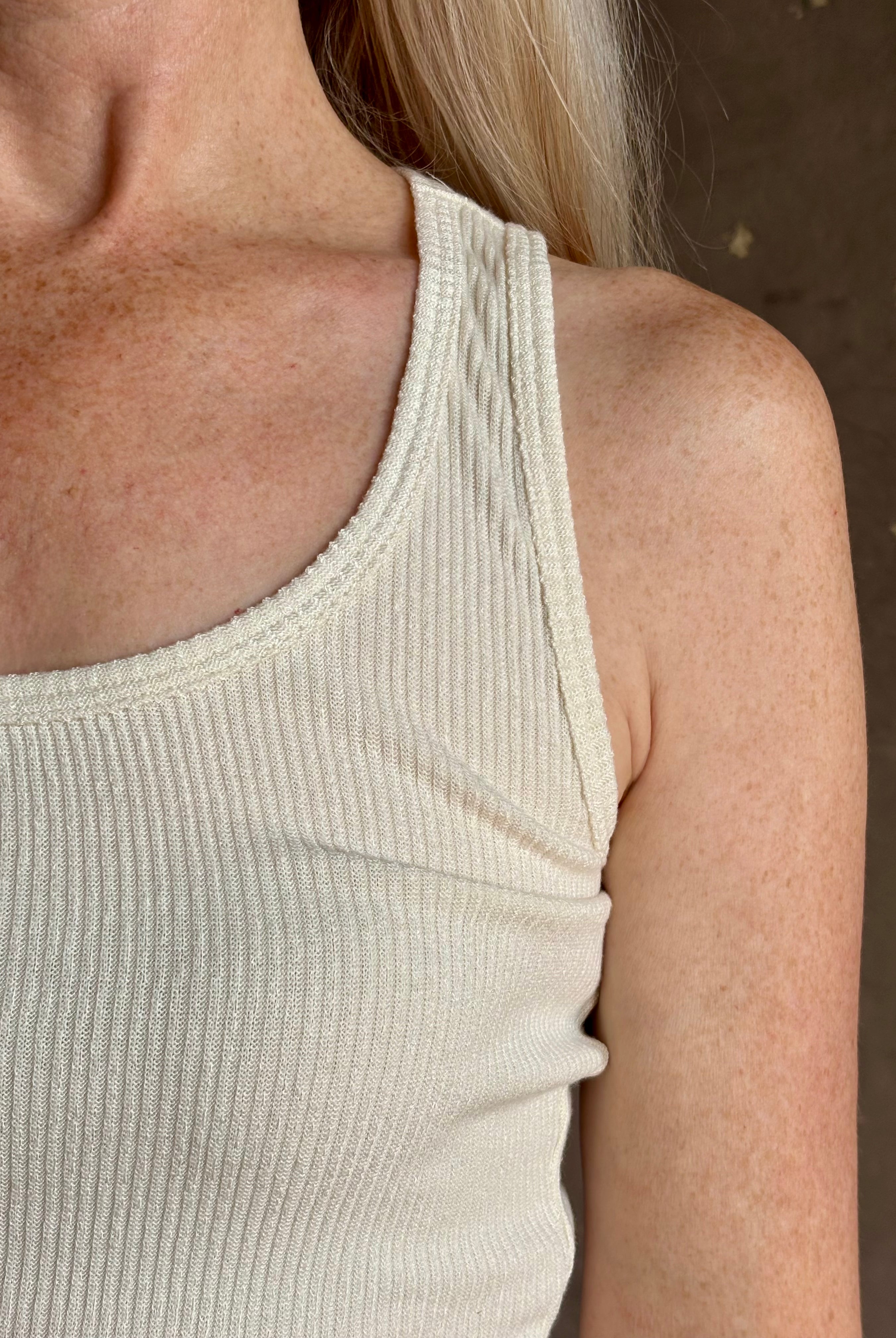 Mature woman wearing Sablyn Coco Scoop Neck cream Tank Top ribbed soft knit comfortable layering basic
