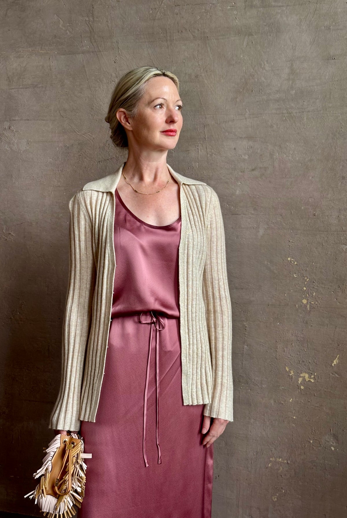 Mature woman wearing Sablyn Sol Maxi Skirt in Desert Bloom silk charmeuse relaxed drawstring waist Fluid
