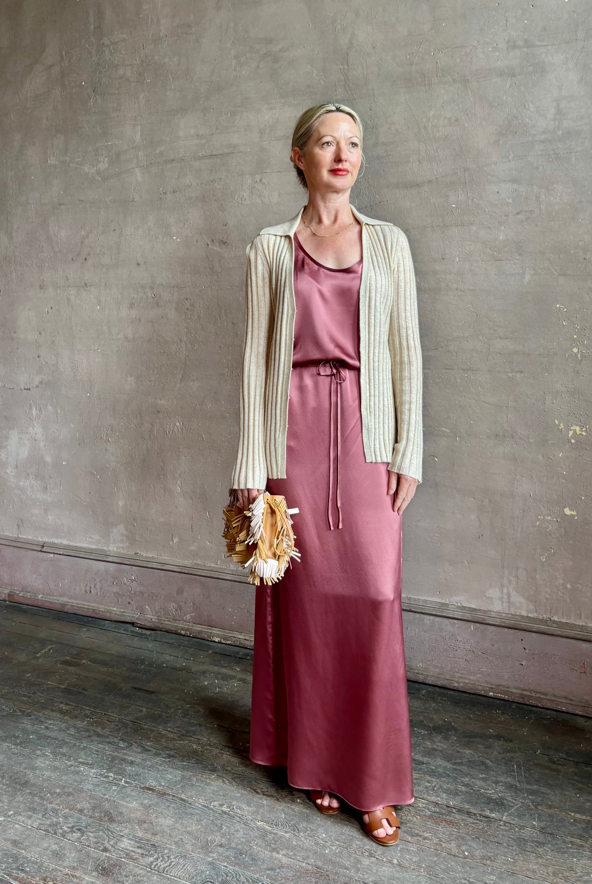 Mature woman wearing Sablyn Sol Maxi Skirt in Desert Bloom silk charmeuse relaxed drawstring waist Fluid