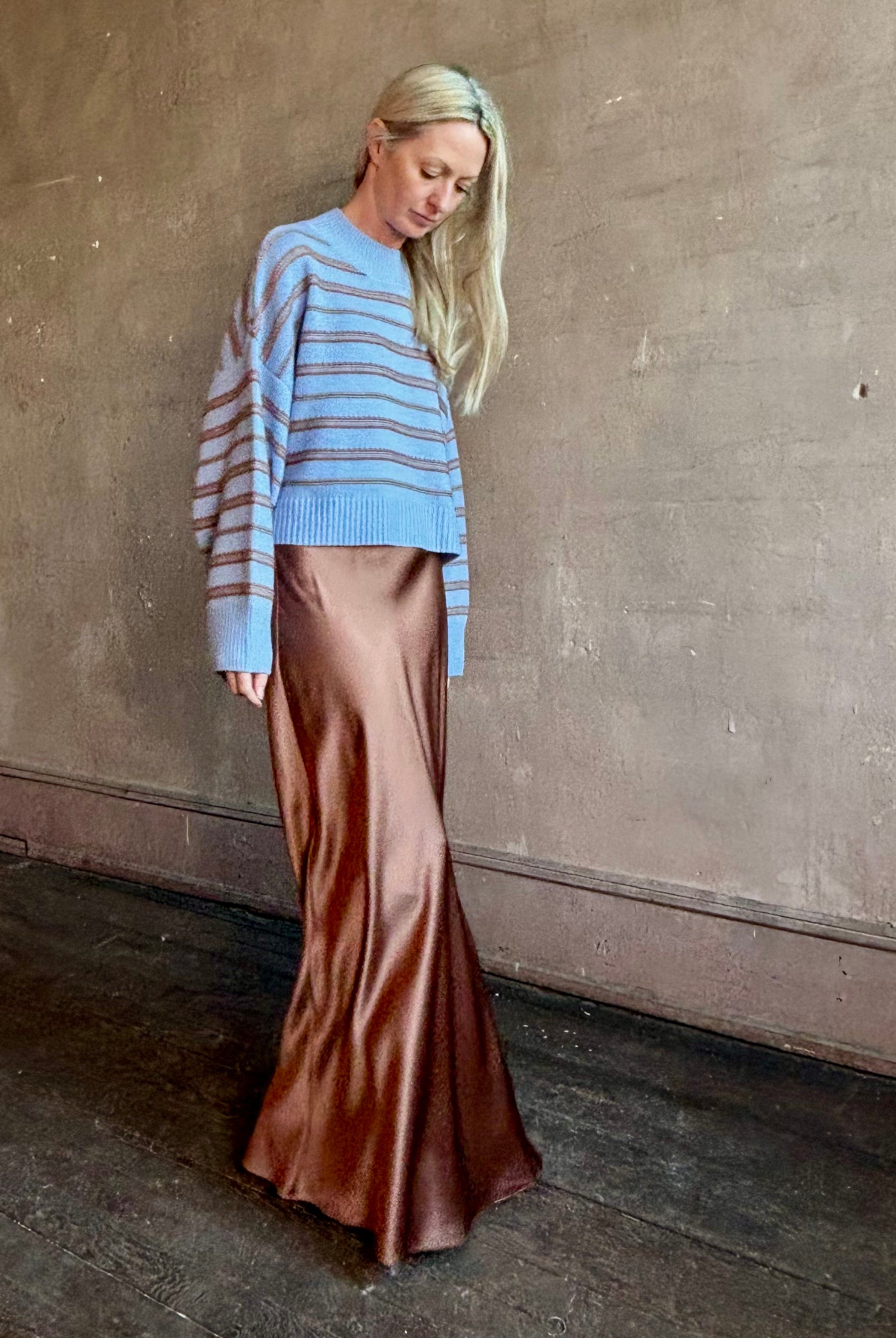 Mature woman wearing luxury brand SABLYN Wells B Cropped Pullover Sweater in Azureous Multi