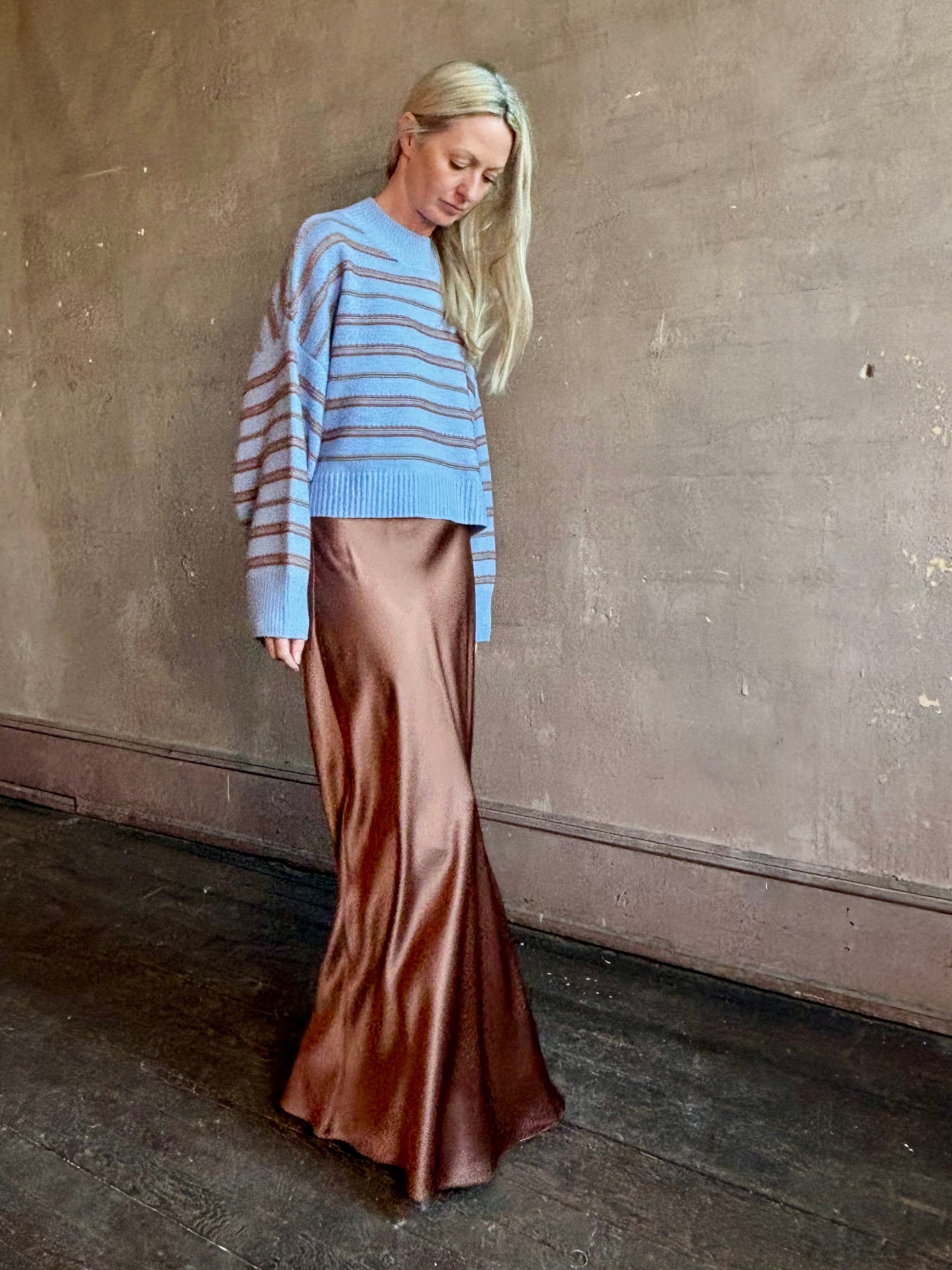 Mature woman wearing luxury brand SABLYN Wells B Cropped Pullover Sweater in Azureous Multi