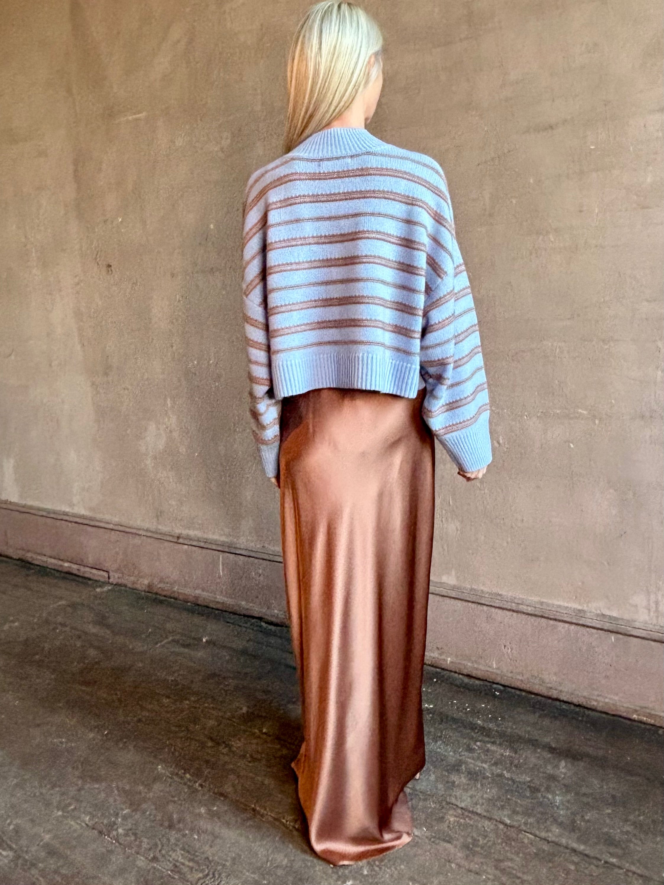 Woman wearing SABLYN Wells B Cropped Pullover Sweater in Azureous Multi