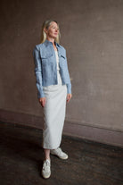 Model wearing SPRWMN Shell White Tube Dress - Designer Strapless Stretch Leather Midi