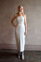 Model wearing SPRWMN Shell White Tube Dress - Designer Strapless Stretch Leather Midi