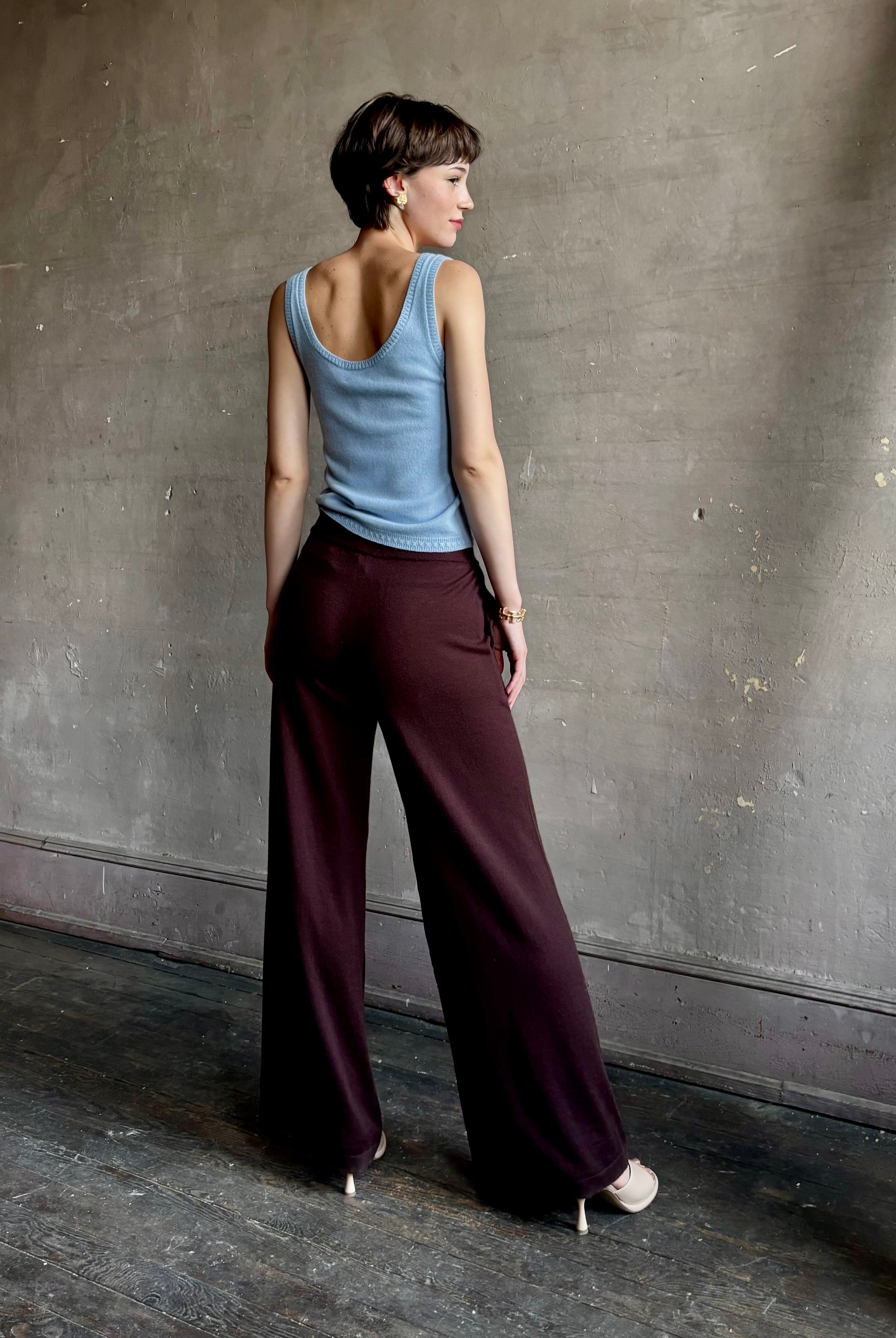 woman wearing SPRWMN premium knit cashmere brown pant elastic waistband mid-rise wide leg