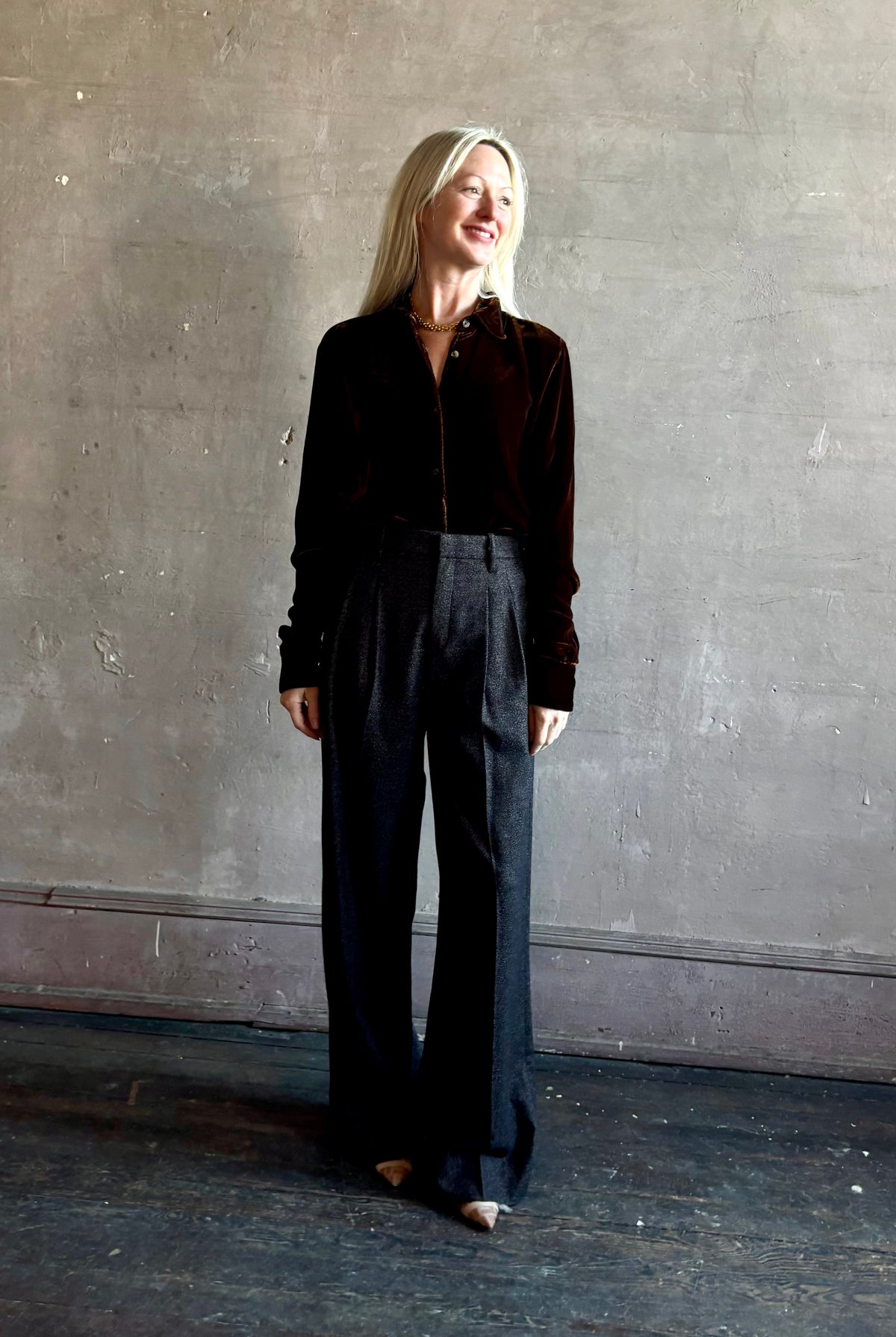 Mature woman wearing SPRWMN Elise Button Up Silk Velvet Top in Warm Brown classic collar long sleeve liquid drape Made in the USA quietly luxurious