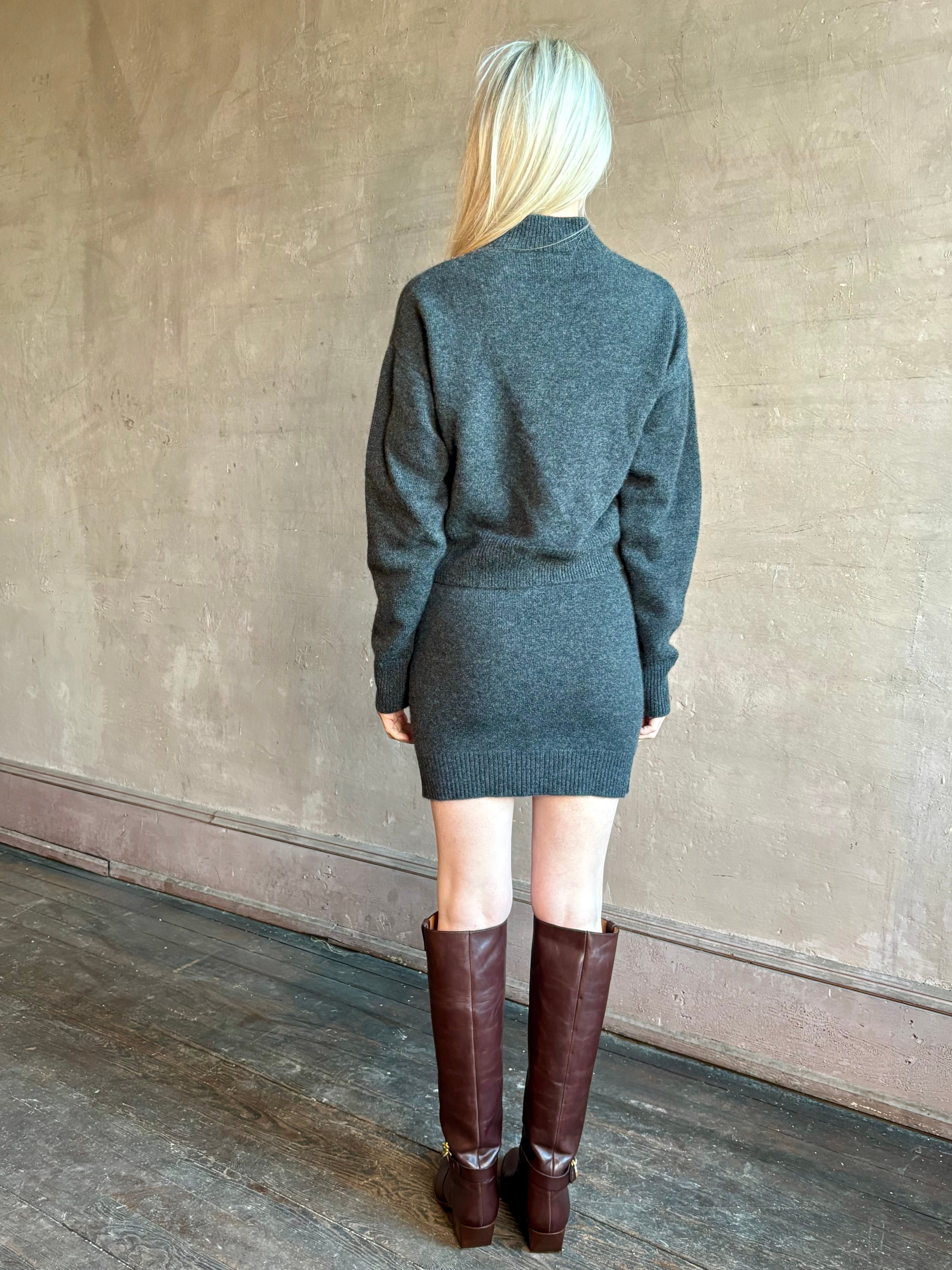 Image of mature woman wearing luxury knitwear SPRWMN Mia Skirt in Charcoal Grey