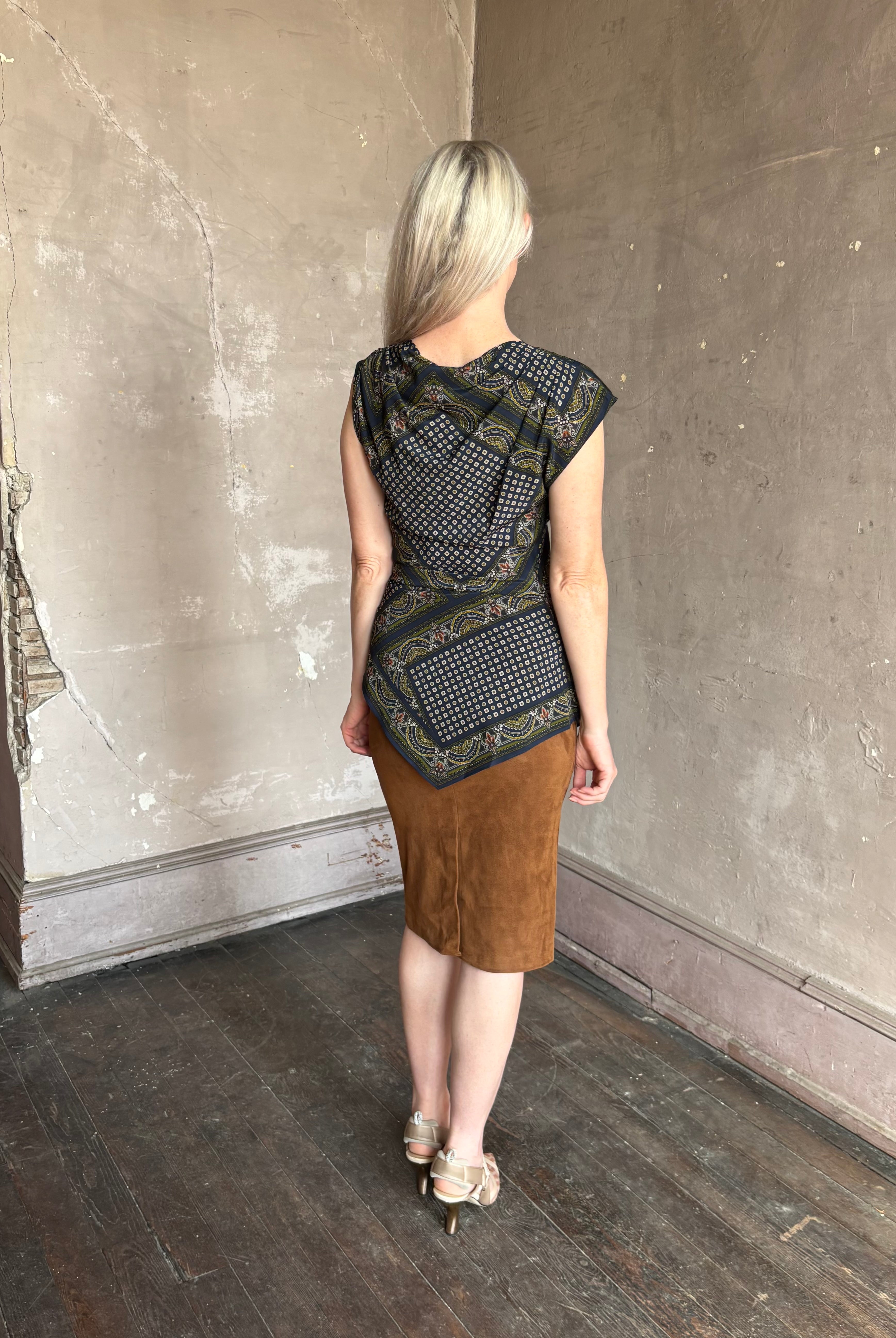 mature woman wearing contemporary designer SPRWMN brown suede leather pencil skirt medium brown