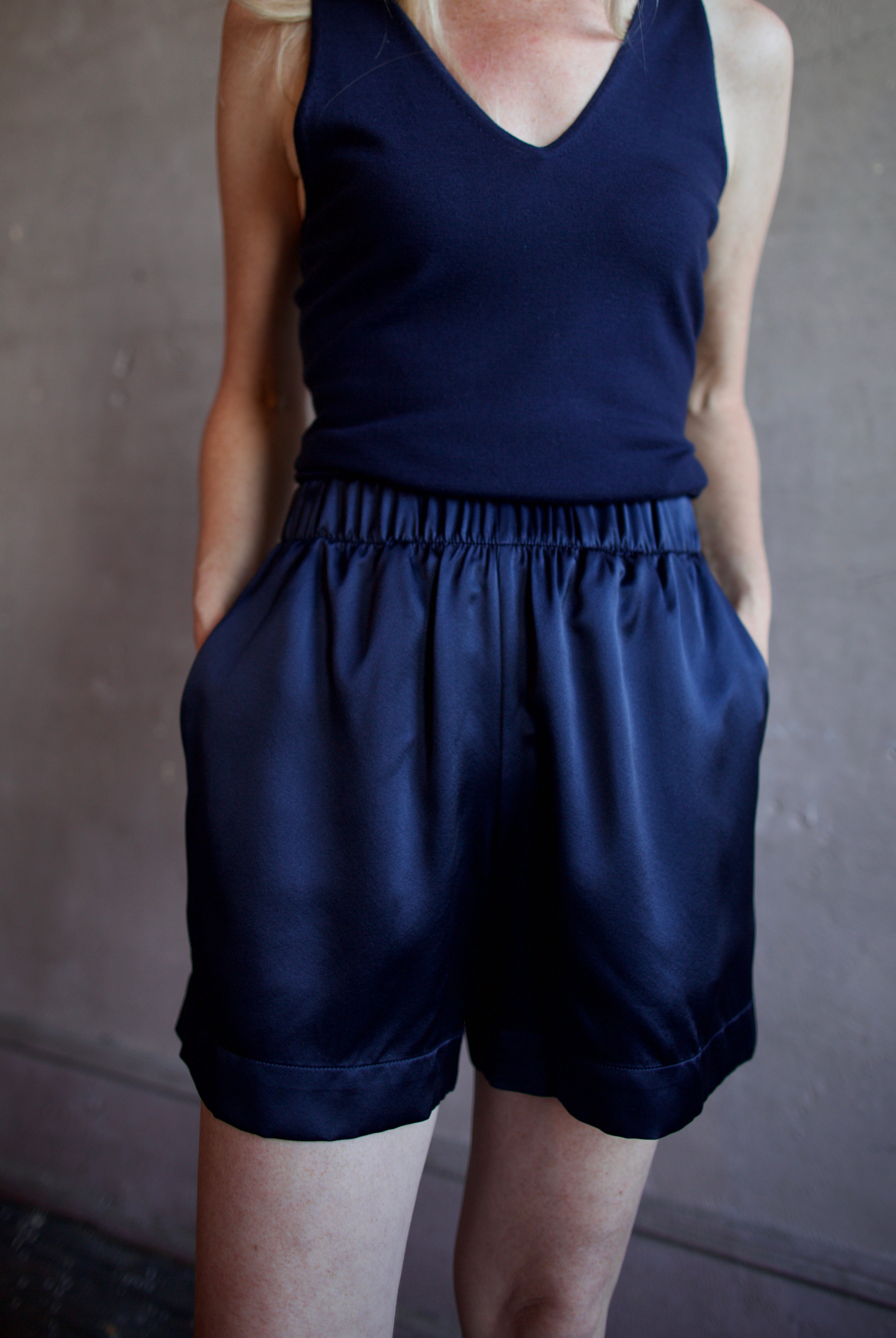 Image of a woman wearing the Sablyn Brynn Shorts and Addyson Layering Tank
