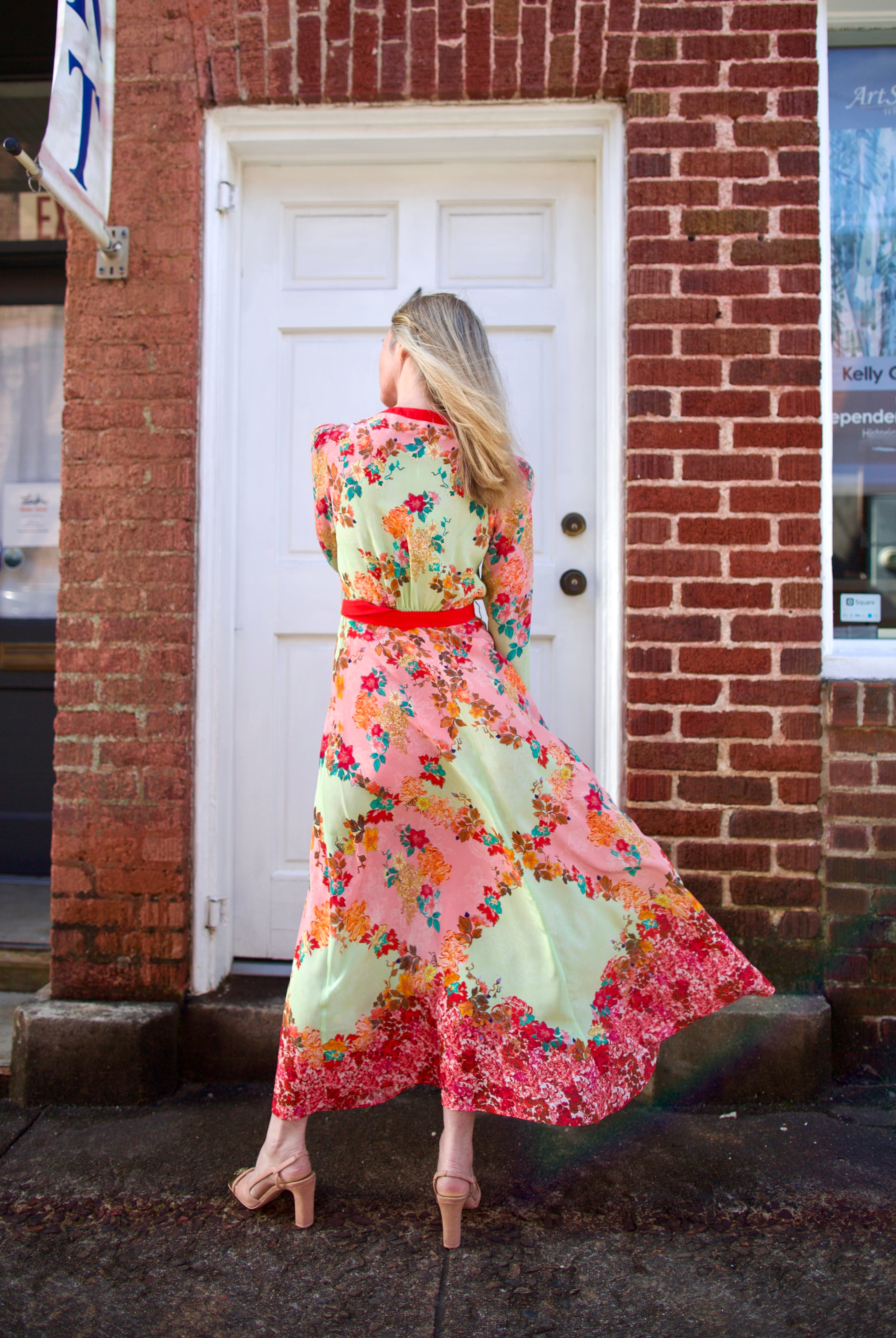 Woman wearing premium silk  Saloni Lea Dress in Florentina Gardeni happy colorway with v-neckline and button front shirt dress