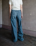 Back view of Woman wearing Slvrlake Eva high rise wide leg denim jeans in Trip to Tulsa wash