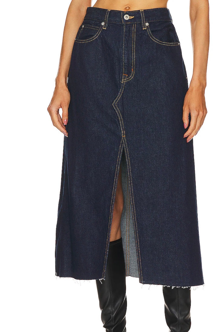 Image featuring a woman wearing the Slvrlake denim pencil skirt with a center split making it flattering and discretely sexy.