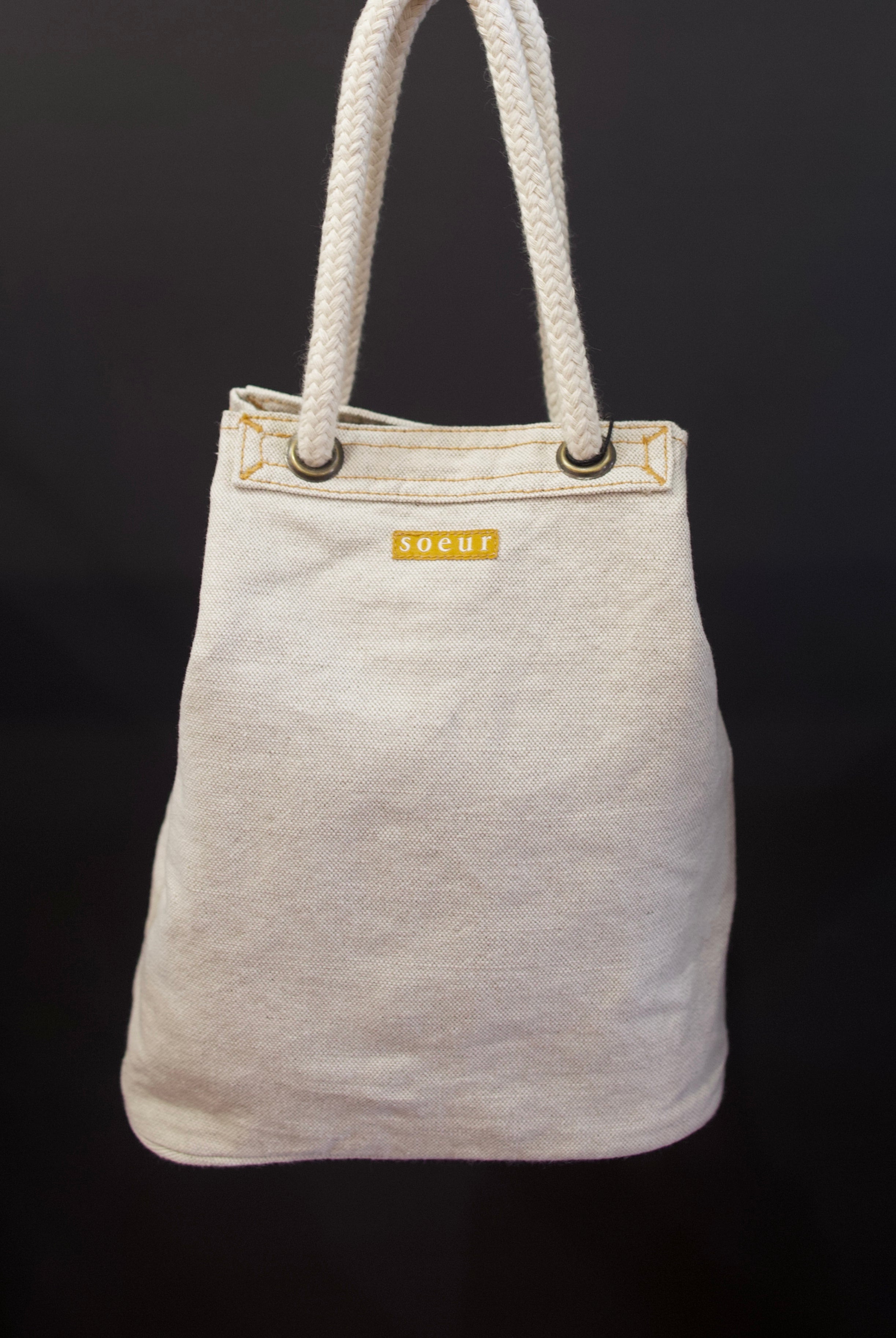 Photo of Soeur Dave handbag with refined sophistication through premium cotton construction and expertly designed crescent silhouette