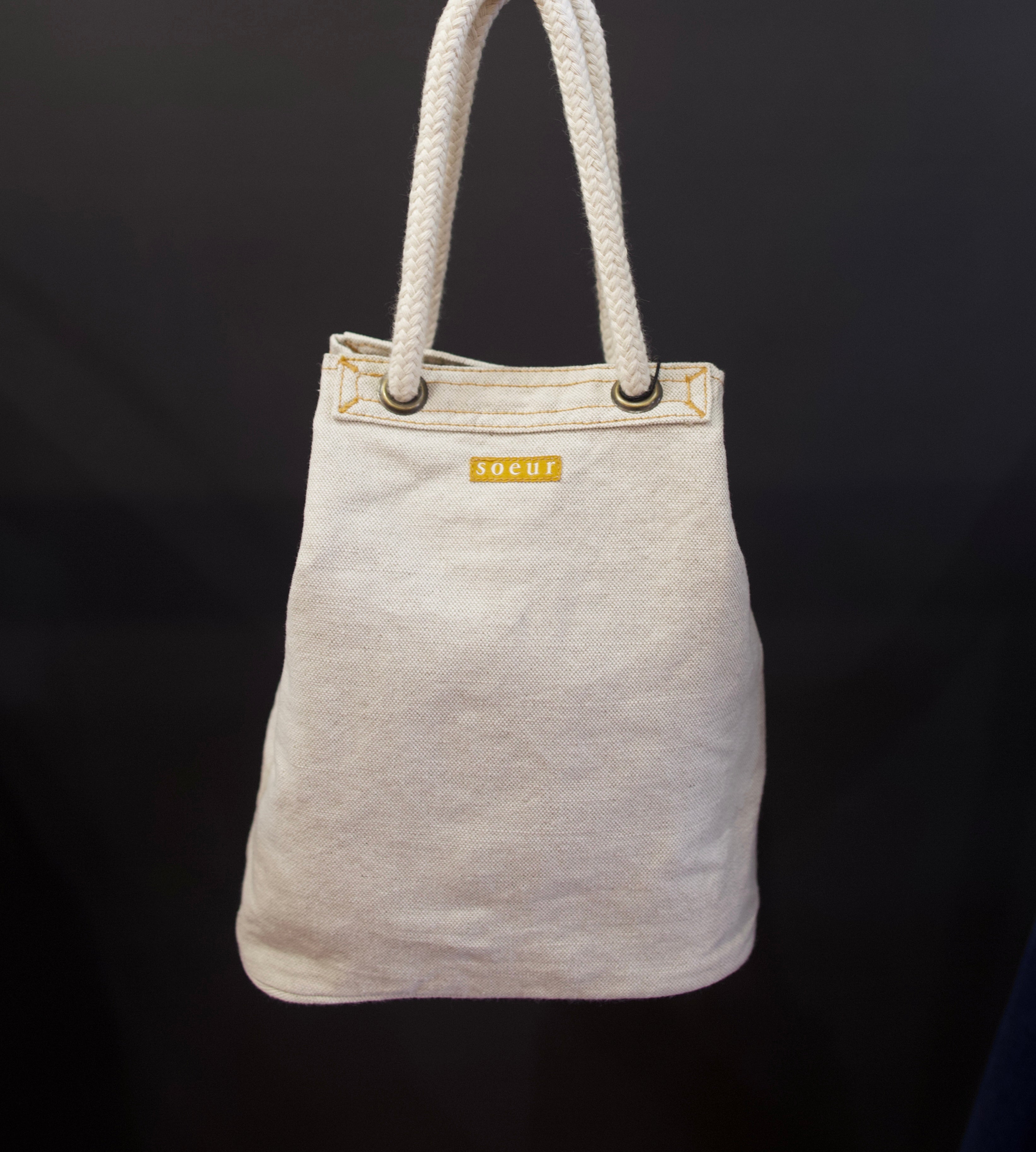 Photo of Soeur Dave handbag with refined sophistication through premium cotton construction and expertly designed crescent silhouette