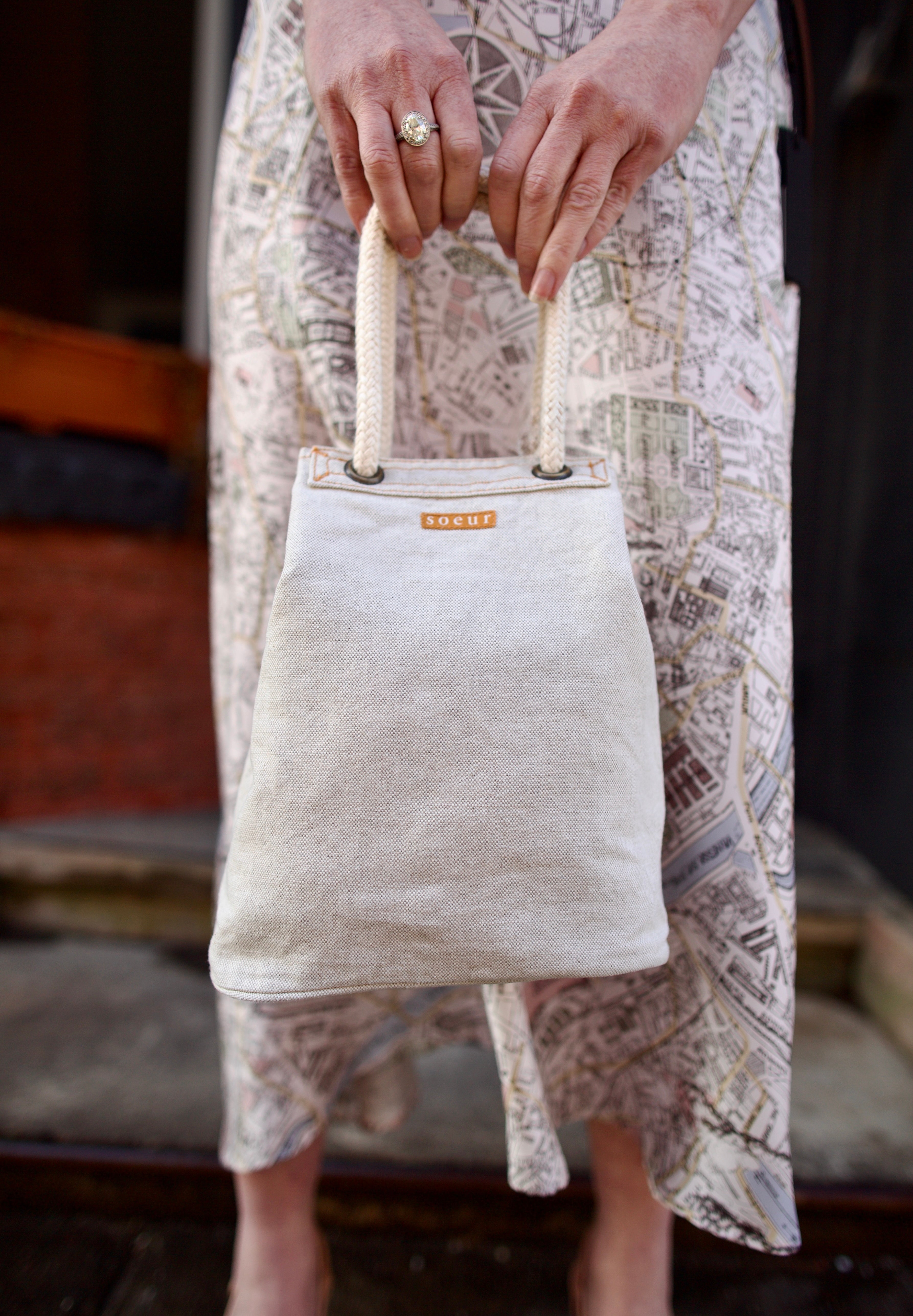 Photo of Soeur Dave handbag with refined sophistication through premium cotton construction and expertly designed crescent silhouette