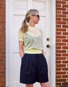 Image of a woman wearing the Soeur Dua Sheer Pullover and Dawson Shorts