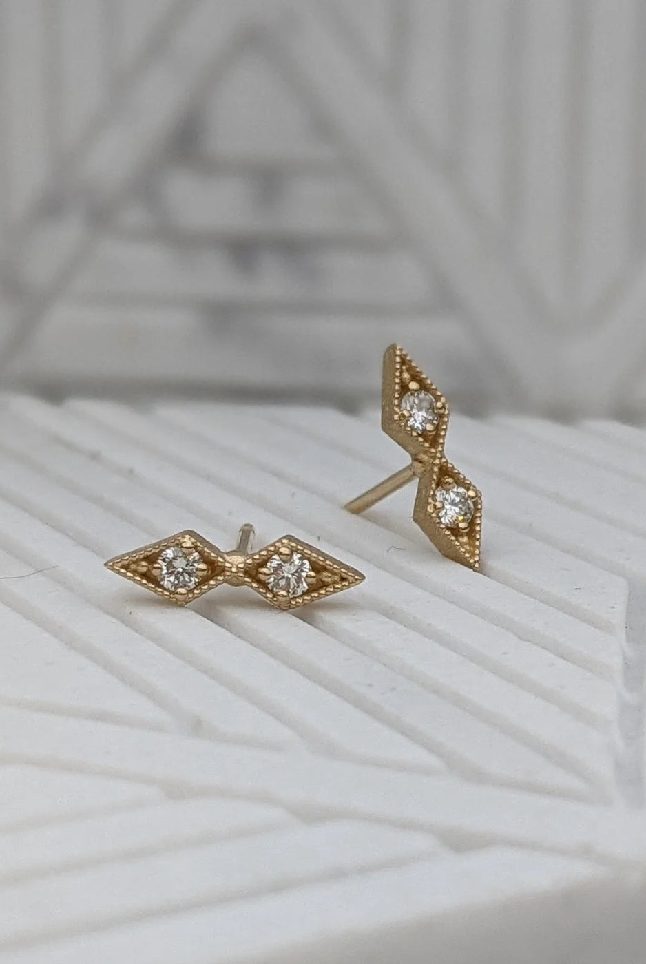 Image of Asheville jeweler STEPHANIE ELLIS Diamond Double Star Stud Earrings in 14K Recycled Yellow Gold Fine Jewelry