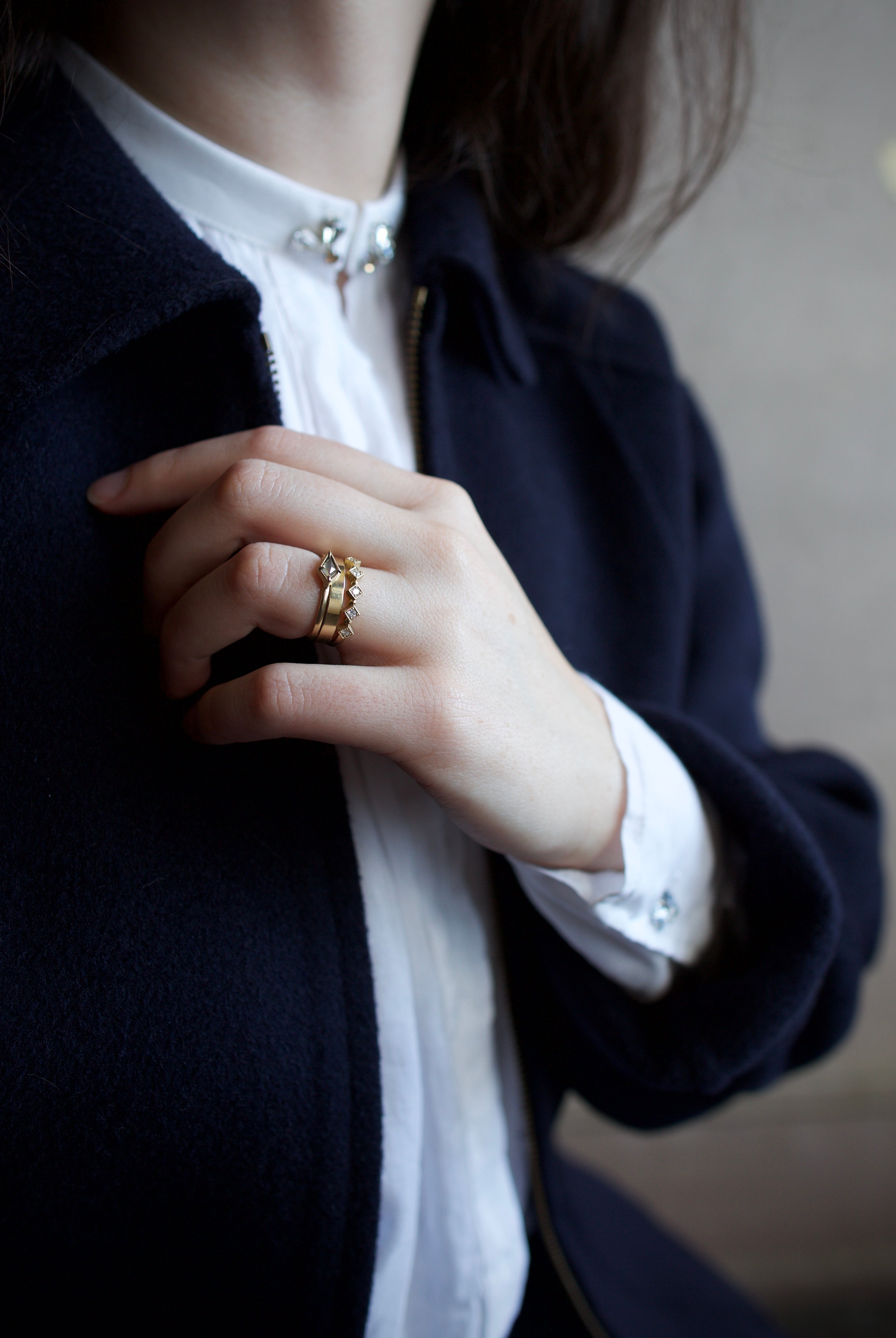 Image of North Carolina jewelry artist STEPHANIE ELLIS Diamond Kite Stacker Ring in 14K Recycled Yellow Gold and 0.4 carat Salt and Pepper Diamond
