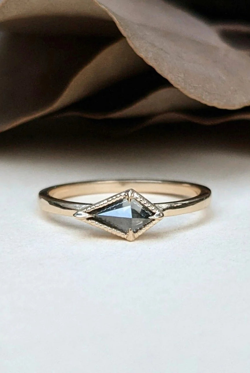 Image of North Carolina jewelry artist STEPHANIE ELLIS Diamond Kite Stacker Ring in 14K Recycled Yellow Gold and 0.4 carat Salt and Pepper Diamond