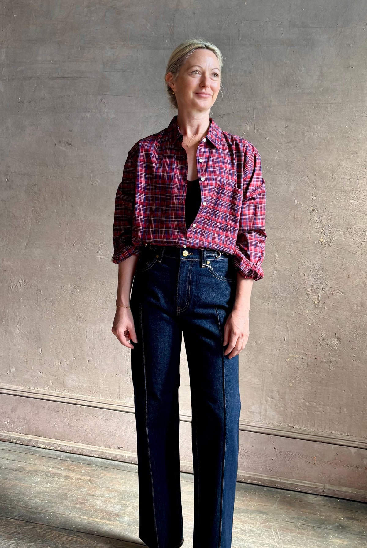 Mature woman in Trovata's Blake Oversized Shirt in Mulled Wine Plaid cotton Relaxed, effortlessly cool California shirting