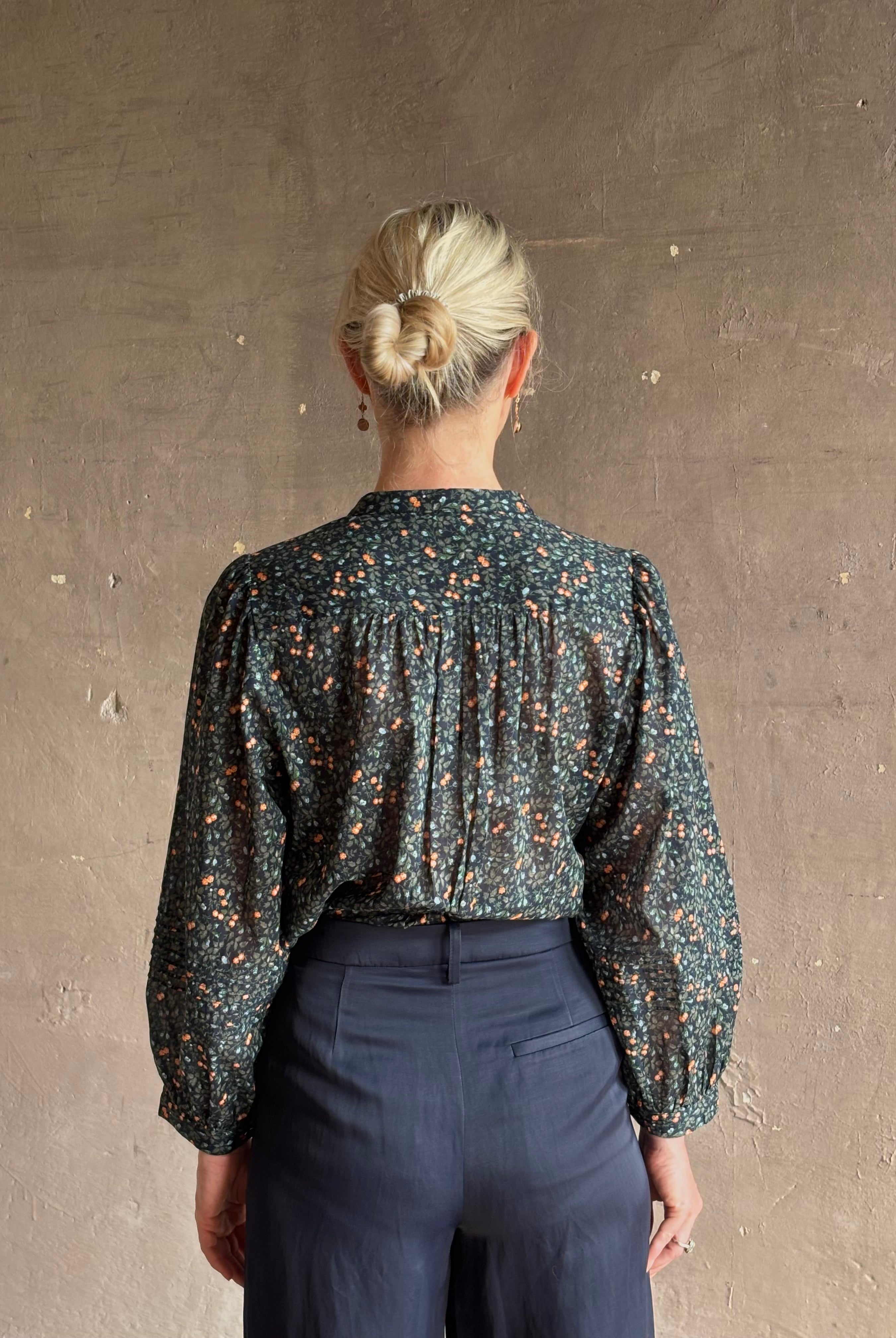 Trovata's Pauline Blouse in Marin Ditsy cotton poplin balloon sleeves. Romantic, movement-rich California charm