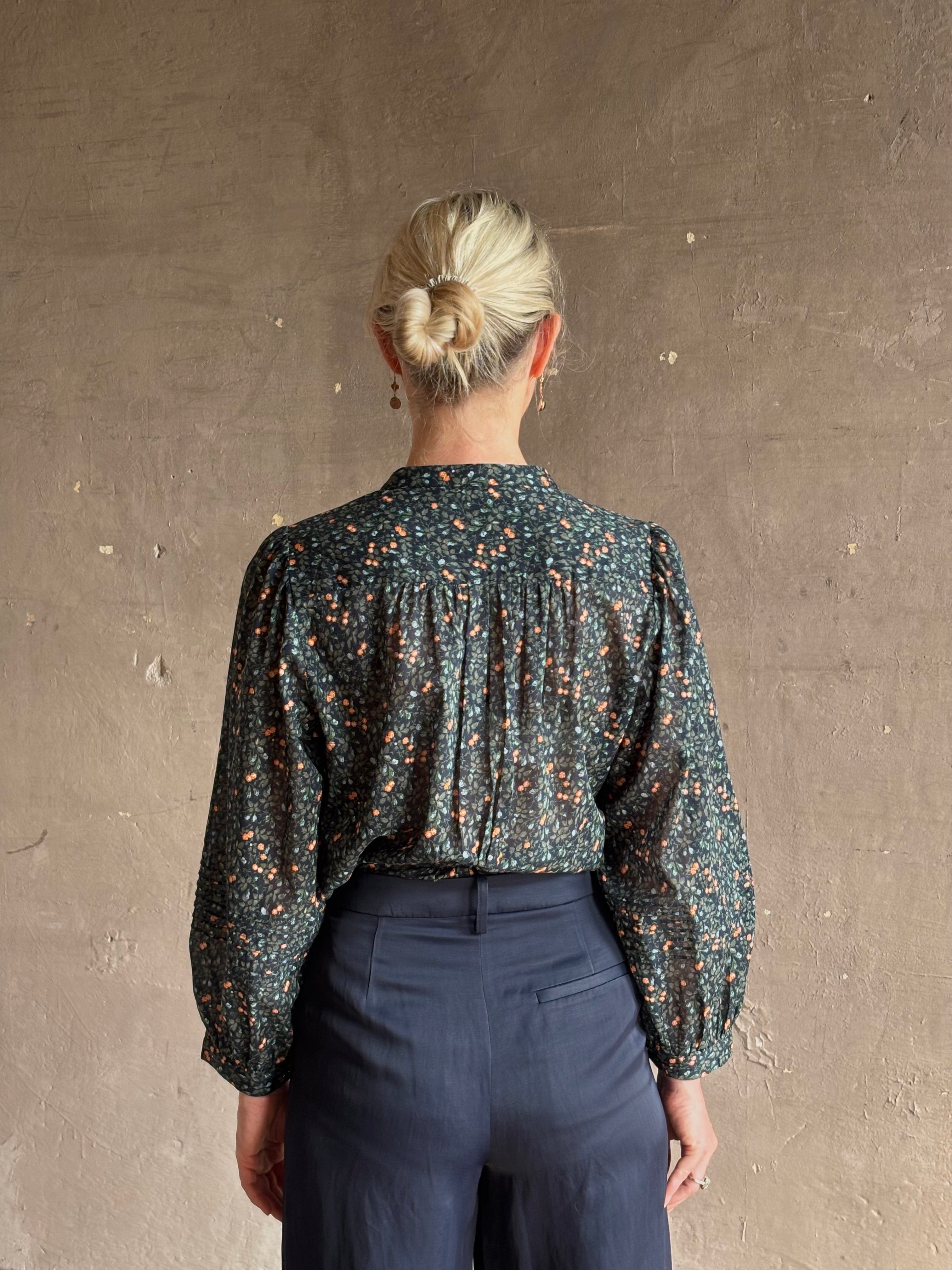Trovata's Pauline Blouse in Marin Ditsy cotton poplin balloon sleeves. Romantic, movement-rich California charm