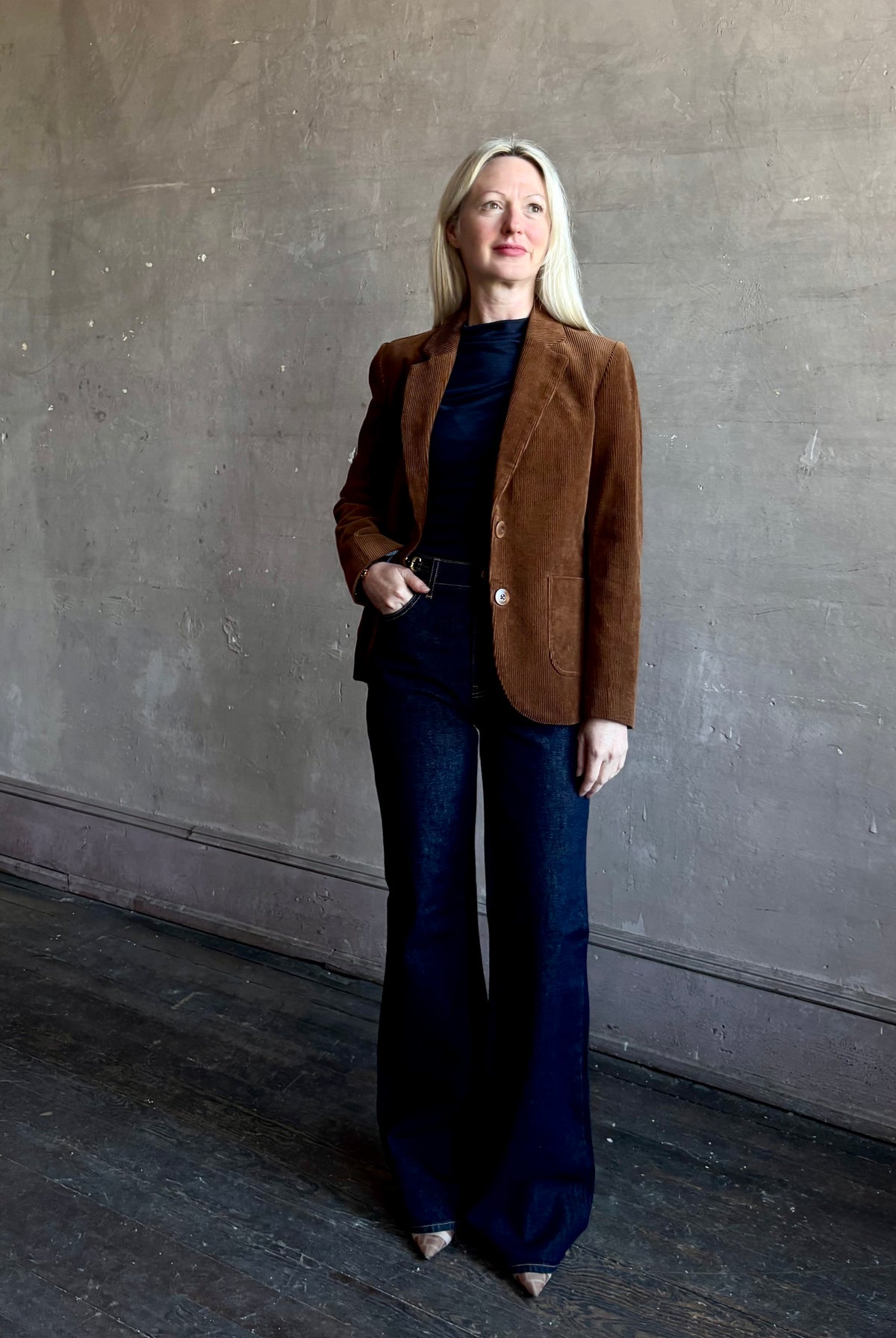 Mature woman wearing Trovata Skylar Cotton Corduroy Two Button Blazer in Walnut Brown front pockets heritage-inspired California tailoring